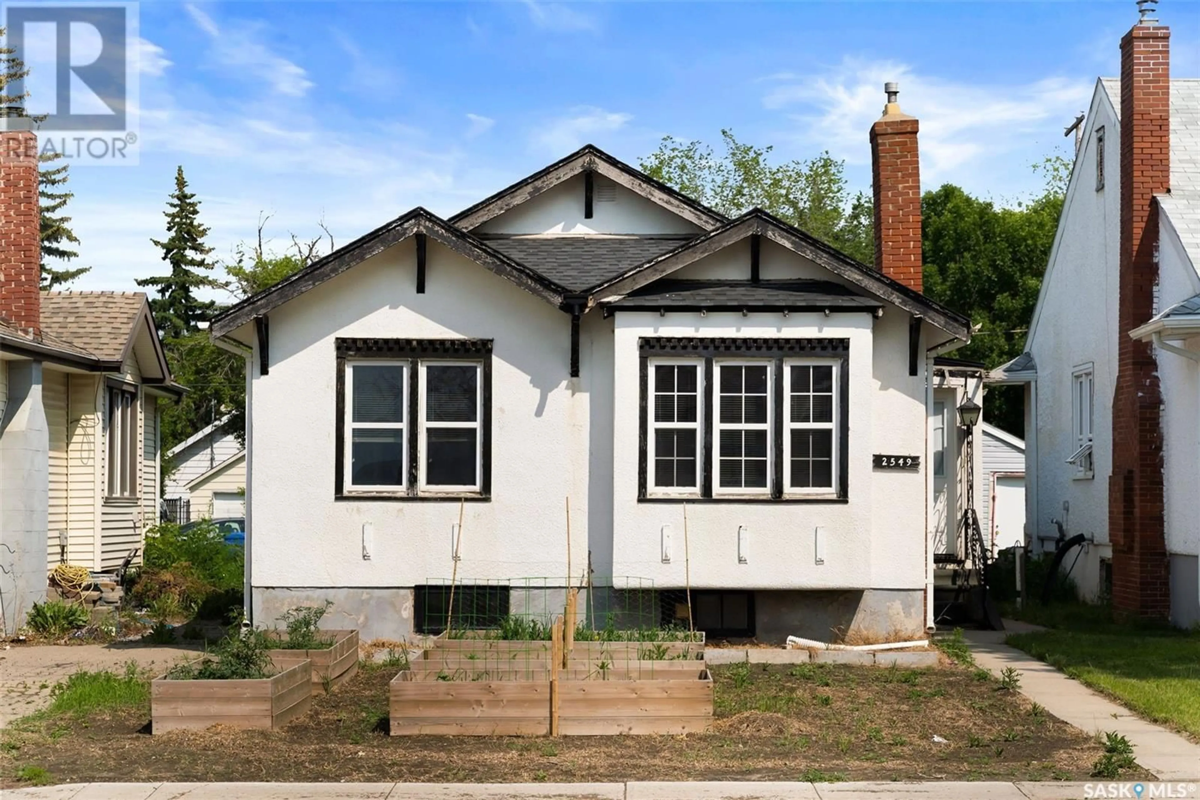 Home with vinyl exterior material, street for 2549 WINNIPEG STREET, Regina Saskatchewan S4P1H6