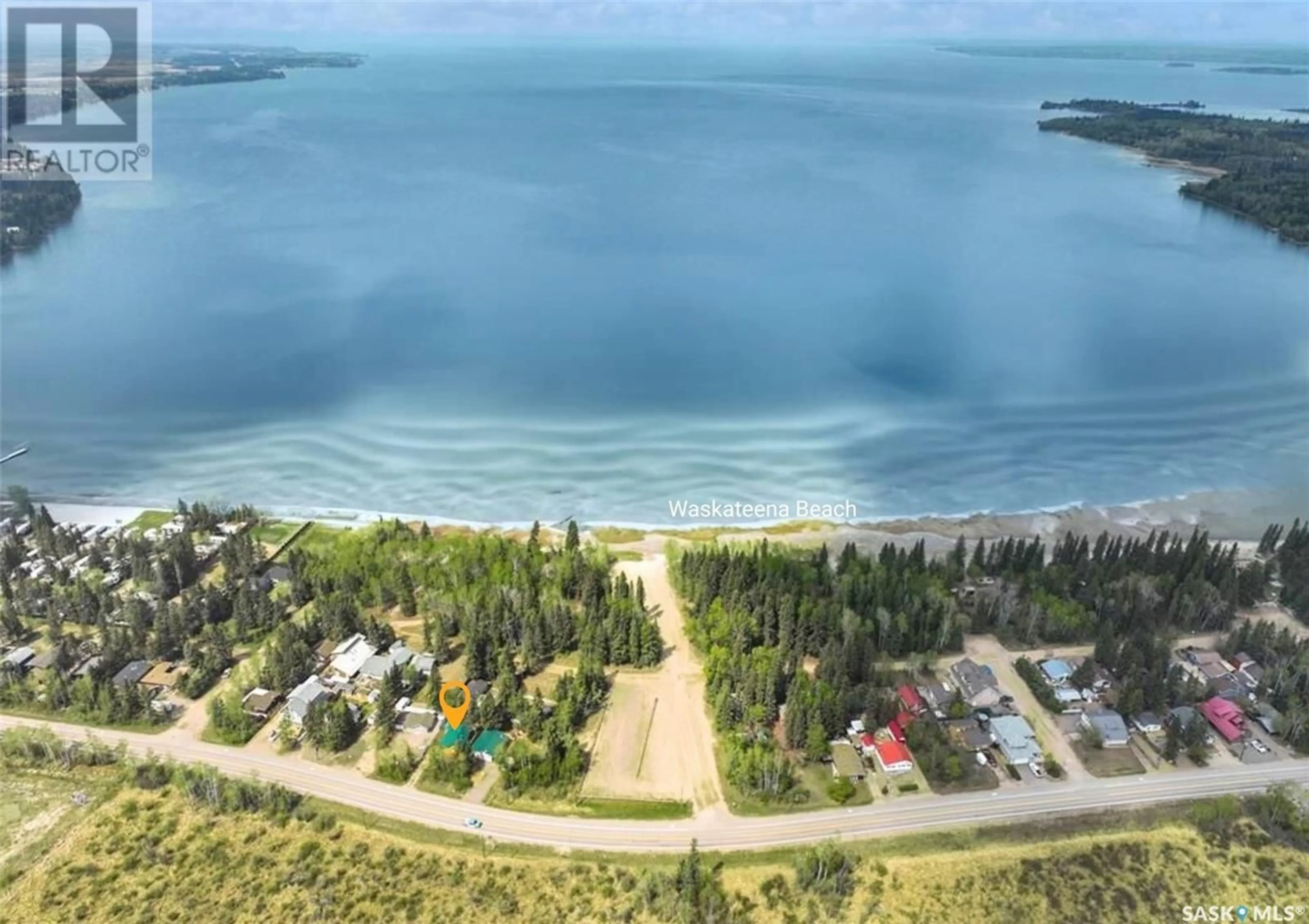 A pic from outside/outdoor area/front of a property/back of a property/a pic from drone, water/lake/river/ocean view for 31 MAIN STREET, Candle Lake Saskatchewan S0J3E0