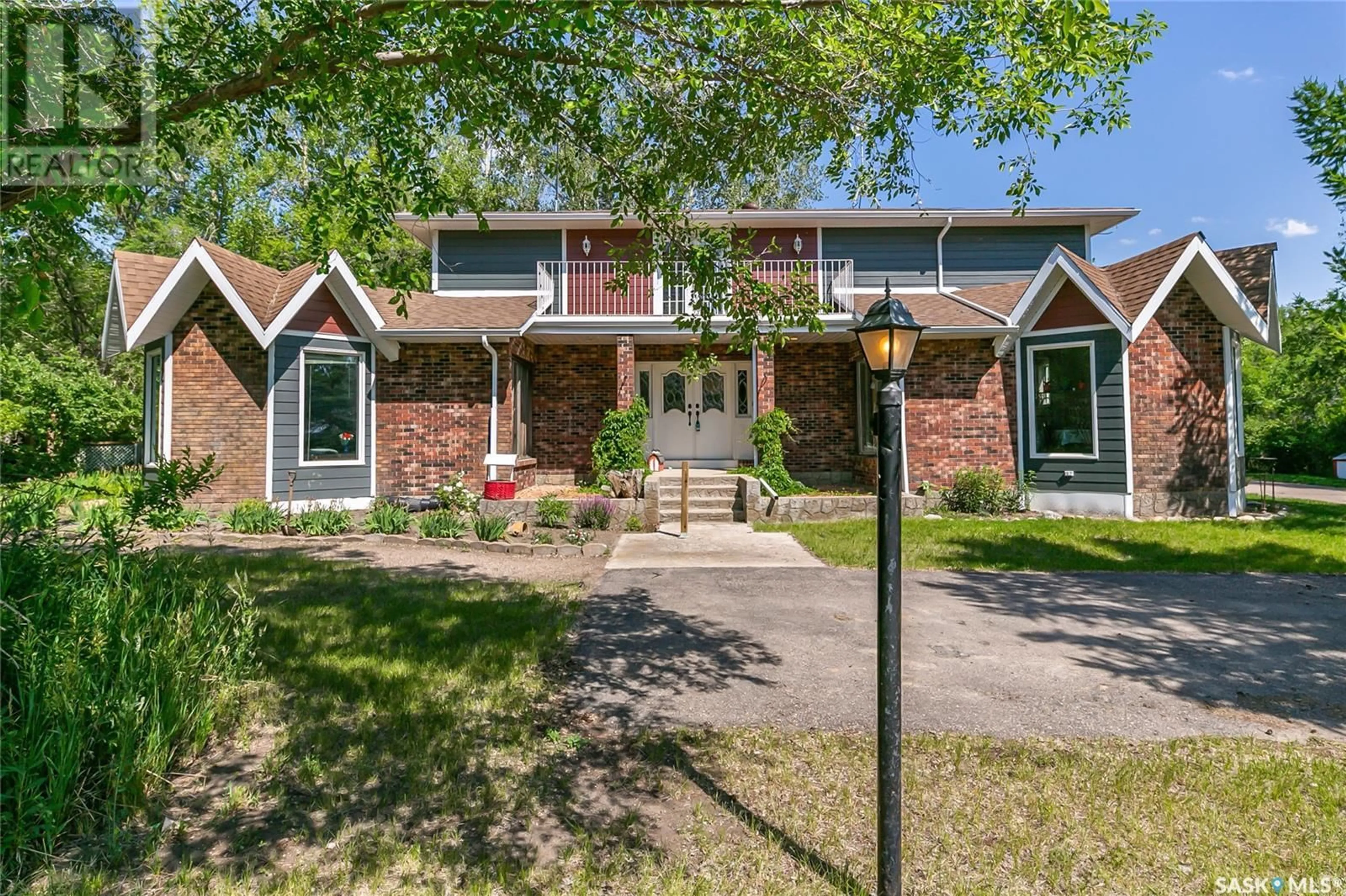 Home with brick exterior material, street for NERNBERG ACREAGE, Longlaketon Rm No. 219 Saskatchewan S0G0W0
