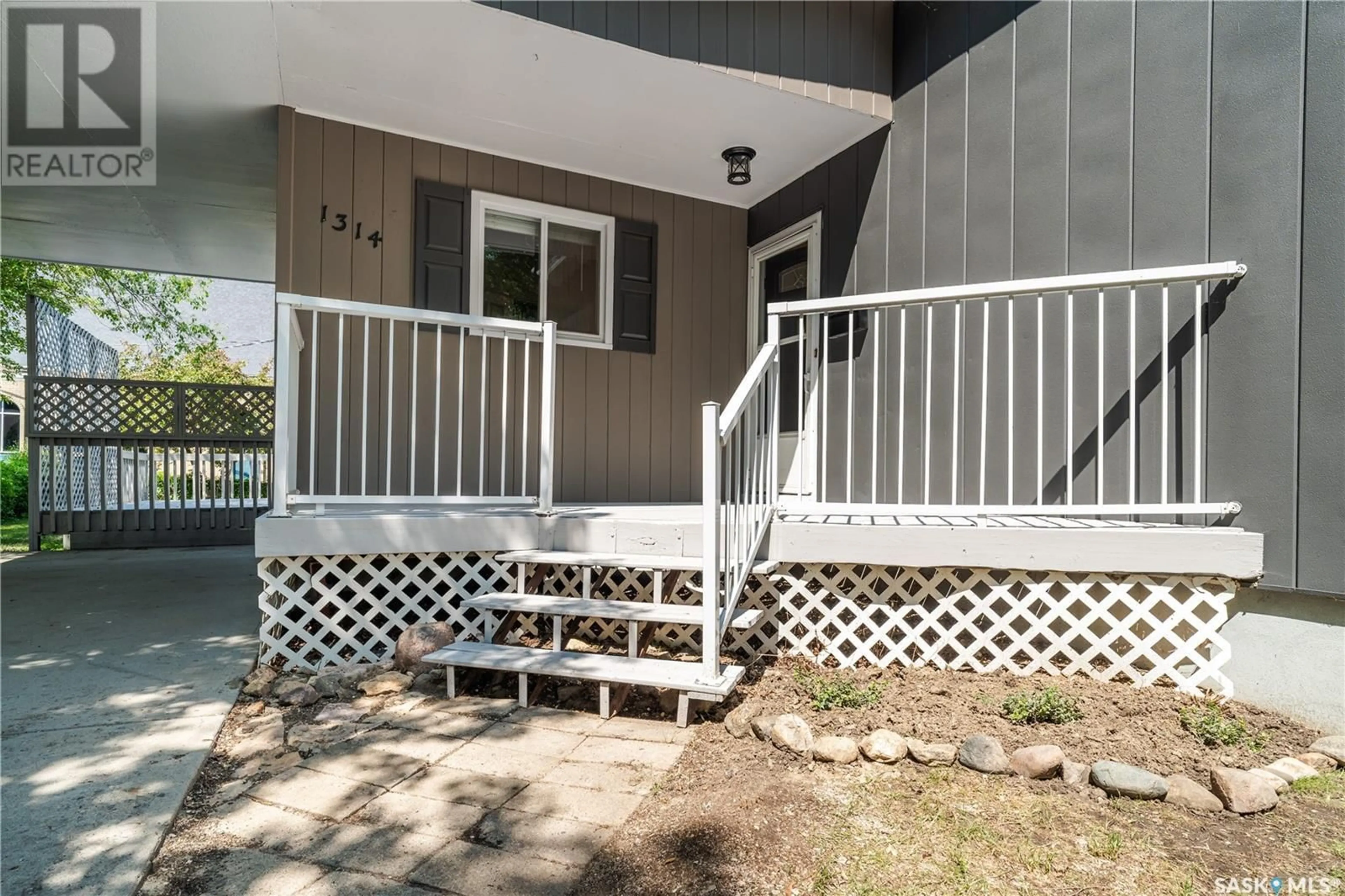 Home with vinyl exterior material, street for 1314 JUBILEE AVENUE, Regina Saskatchewan S4S3S9
