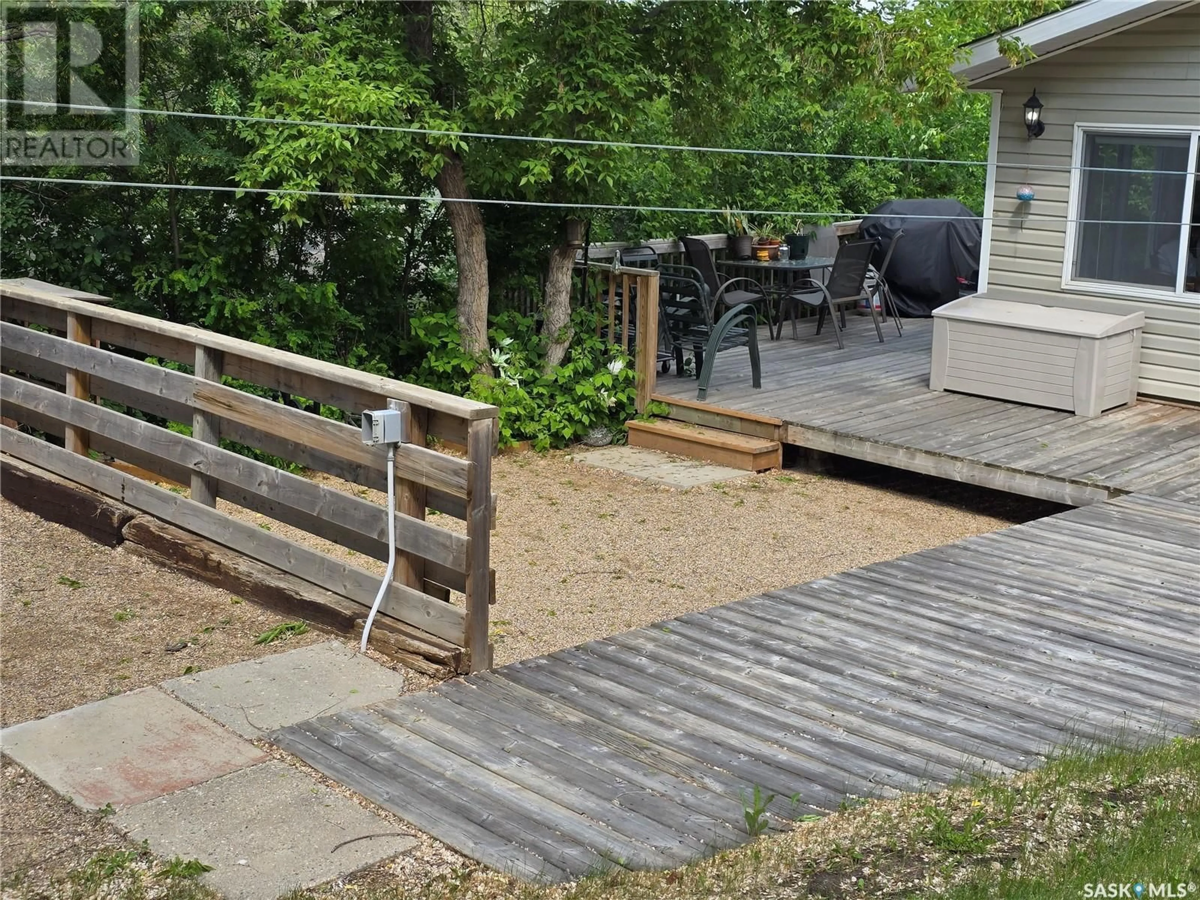 Patio, street for 206 ALBERT STREET, Manitou Beach Saskatchewan S0K1T1