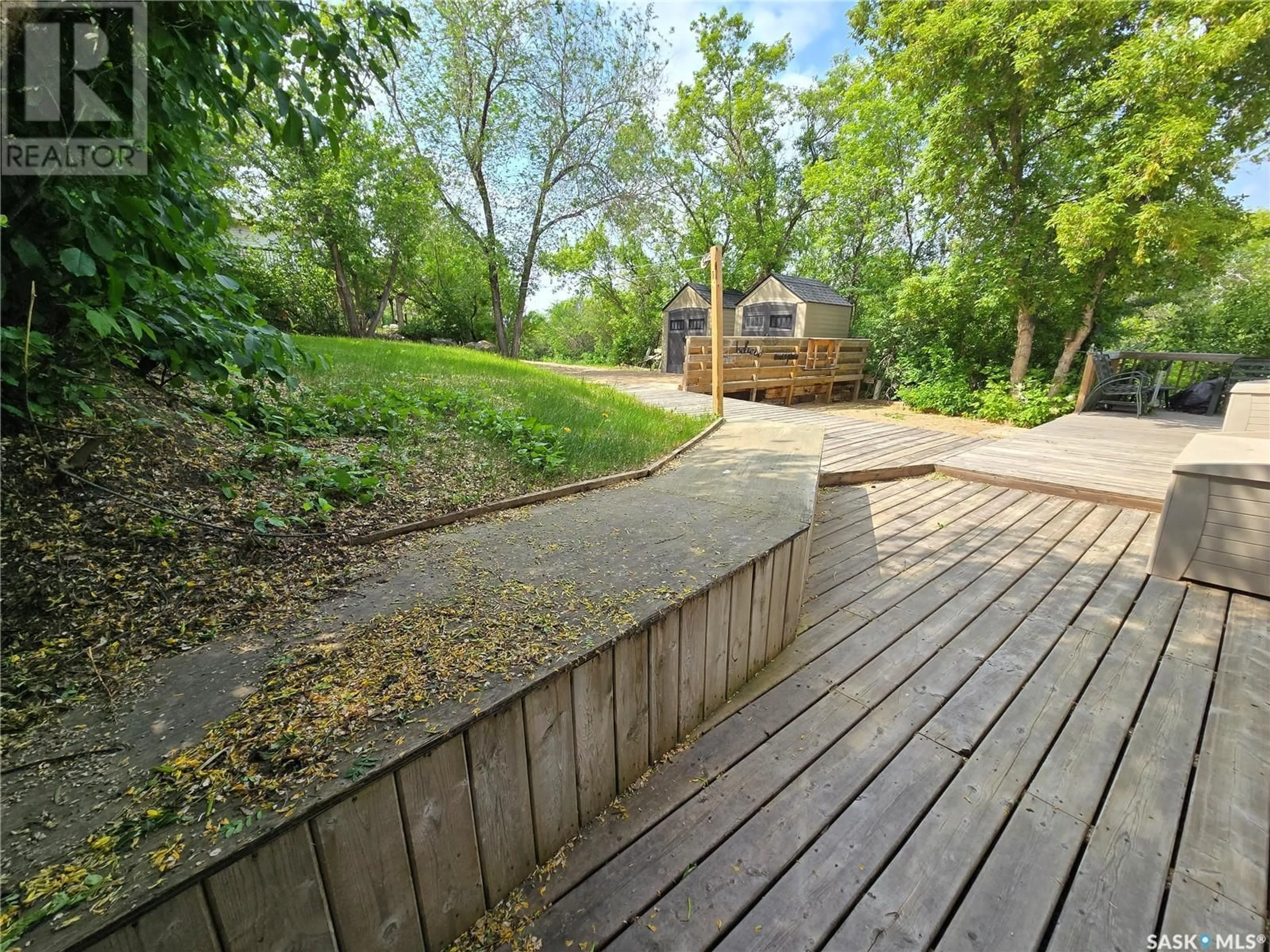 A pic from outside/outdoor area/front of a property/back of a property/a pic from drone, forest/trees view for 206 ALBERT STREET, Manitou Beach Saskatchewan S0K1T1