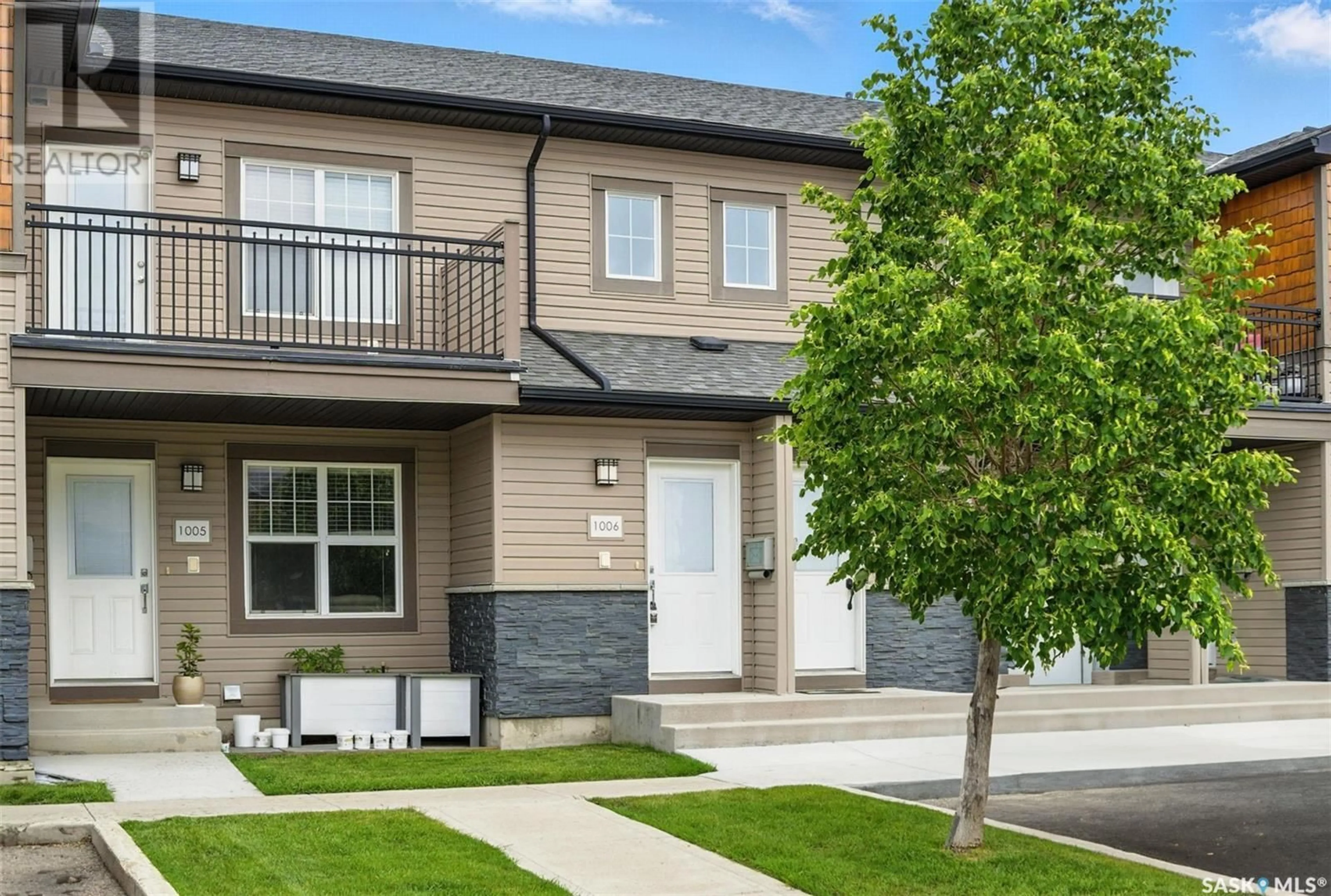 Home with vinyl exterior material, street for 1015 - 1006 PATRICK CRESCENT, Saskatoon Saskatchewan S7W0M5