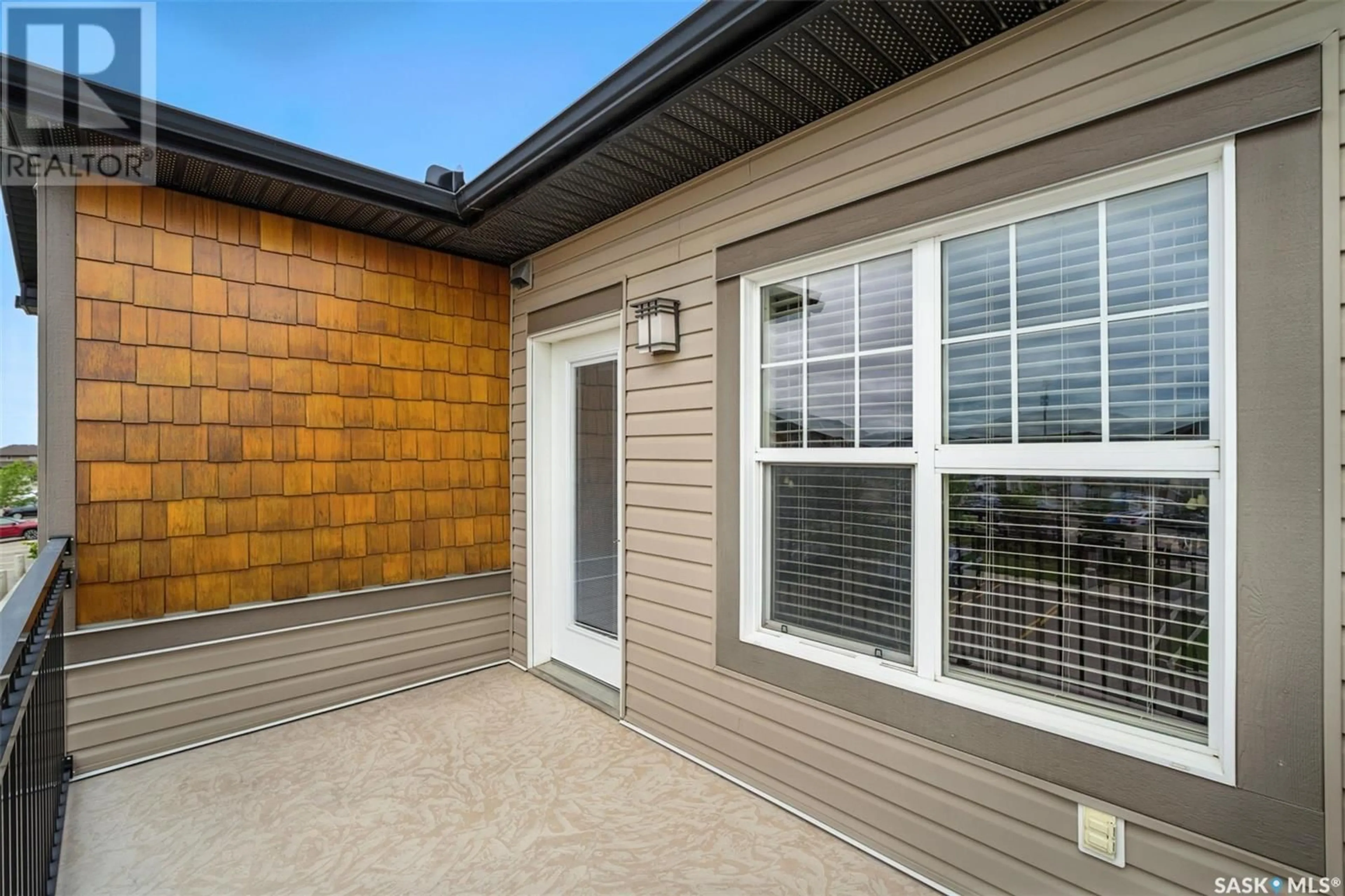 Home with vinyl exterior material, street for 1015 - 1006 PATRICK CRESCENT, Saskatoon Saskatchewan S7W0M5