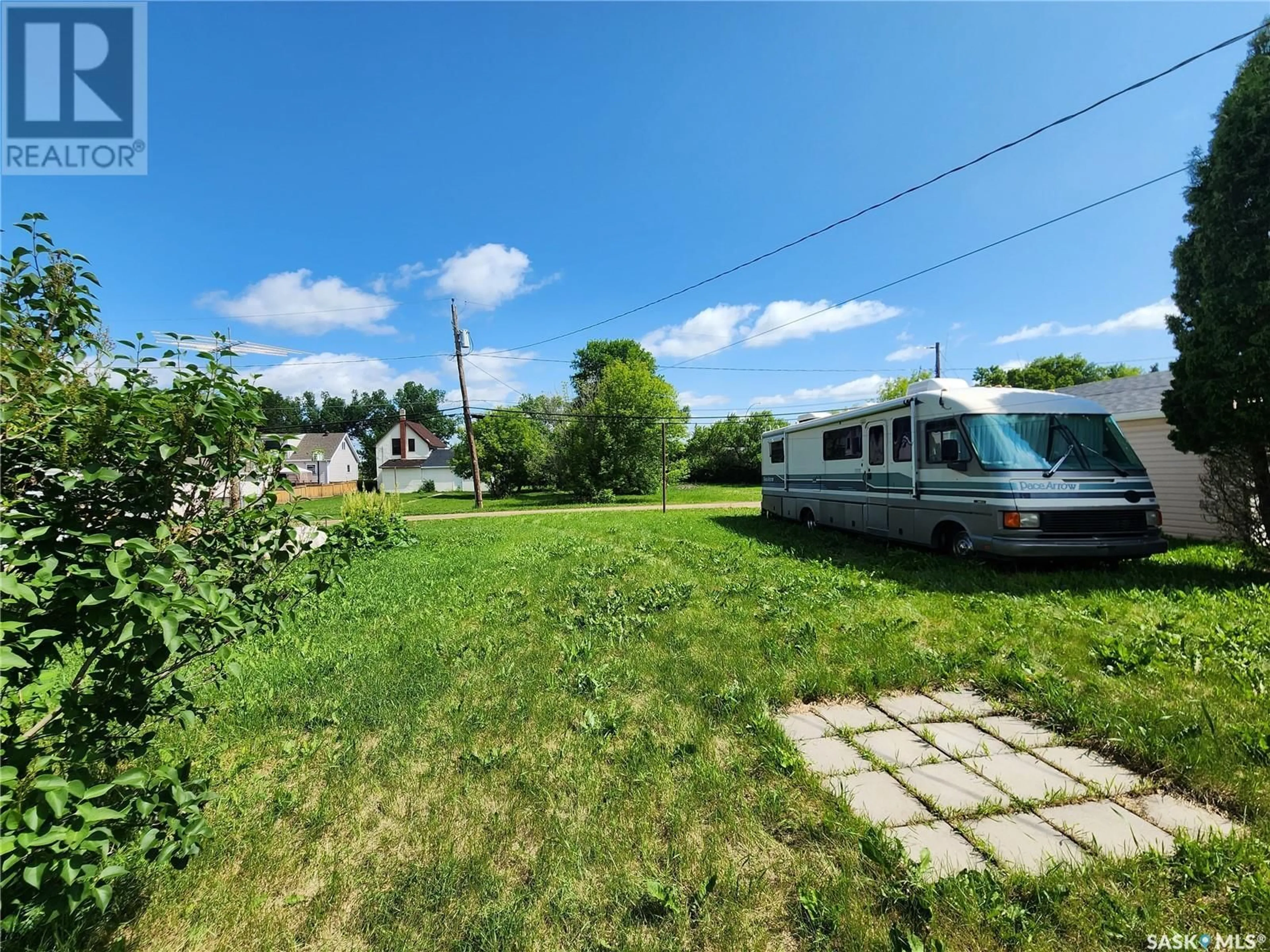A pic from outside/outdoor area/front of a property/back of a property/a pic from drone, street for 442 4TH AVENUE, Melville Saskatchewan S0A2P0