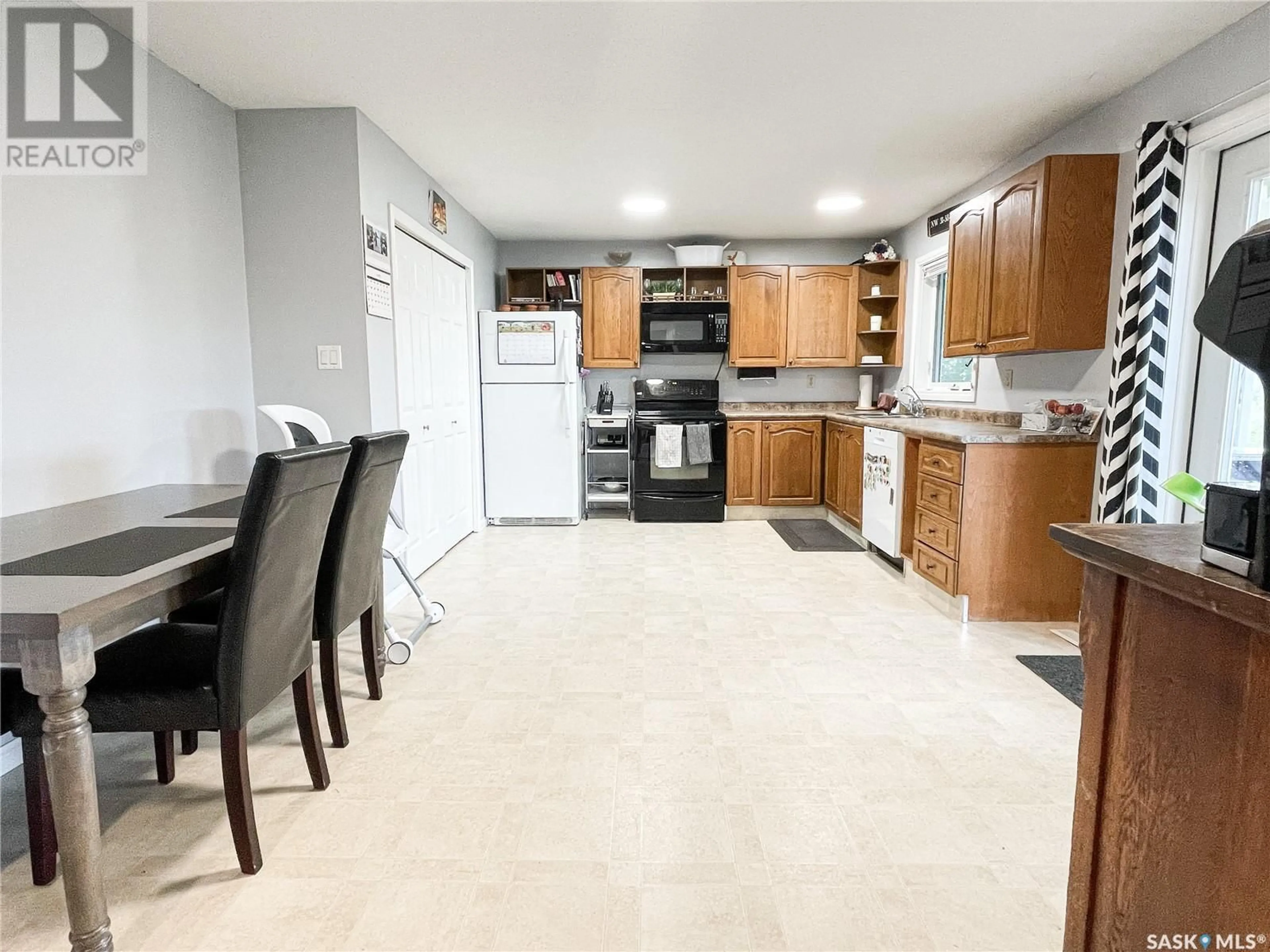 Open concept kitchen, ceramic/tile floor for ACREAGE SE, Meadow Lake Rm No.588 Saskatchewan S9X1Y8