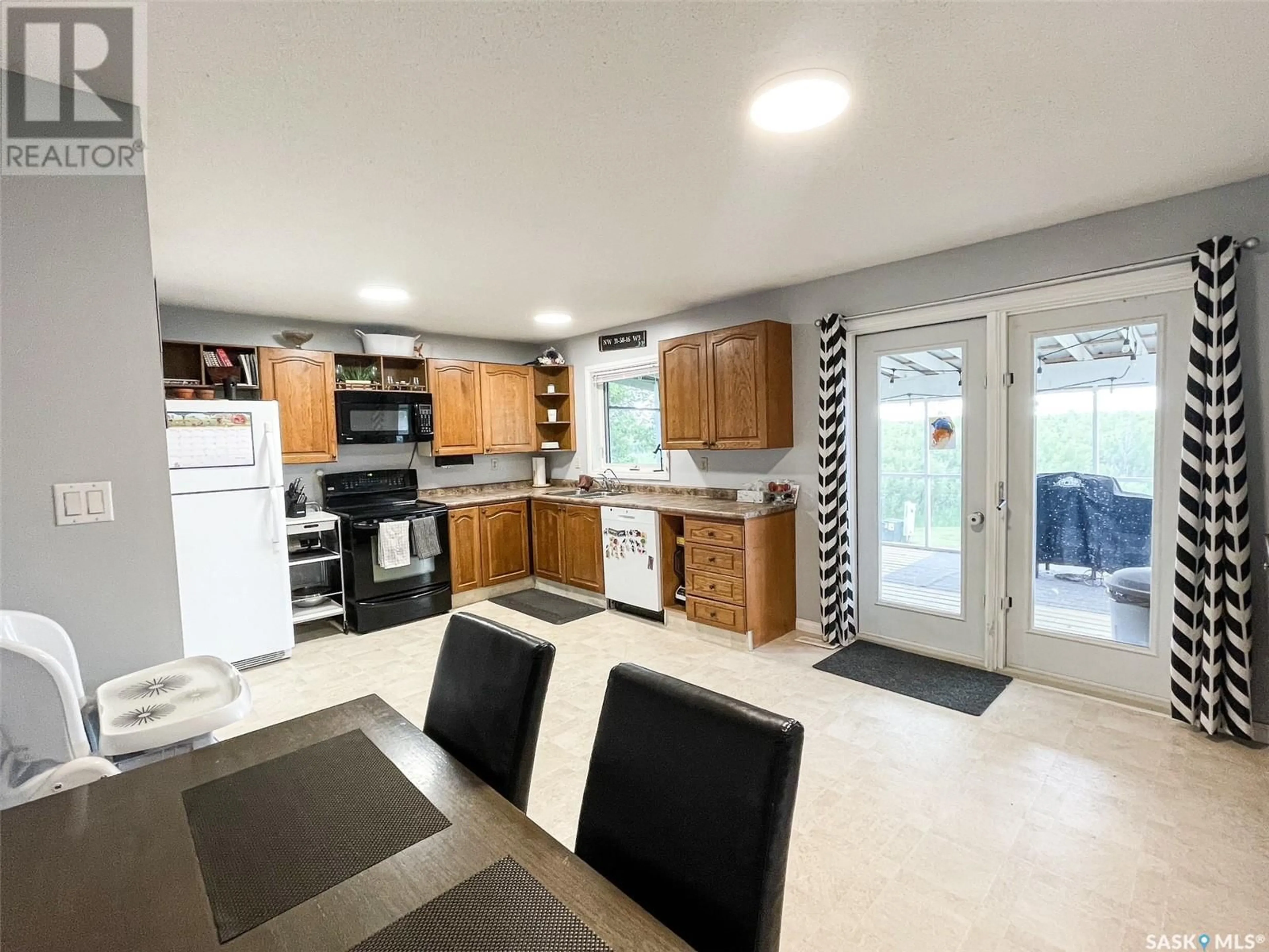 Open concept kitchen, ceramic/tile floor for ACREAGE SE, Meadow Lake Rm No.588 Saskatchewan S9X1Y8
