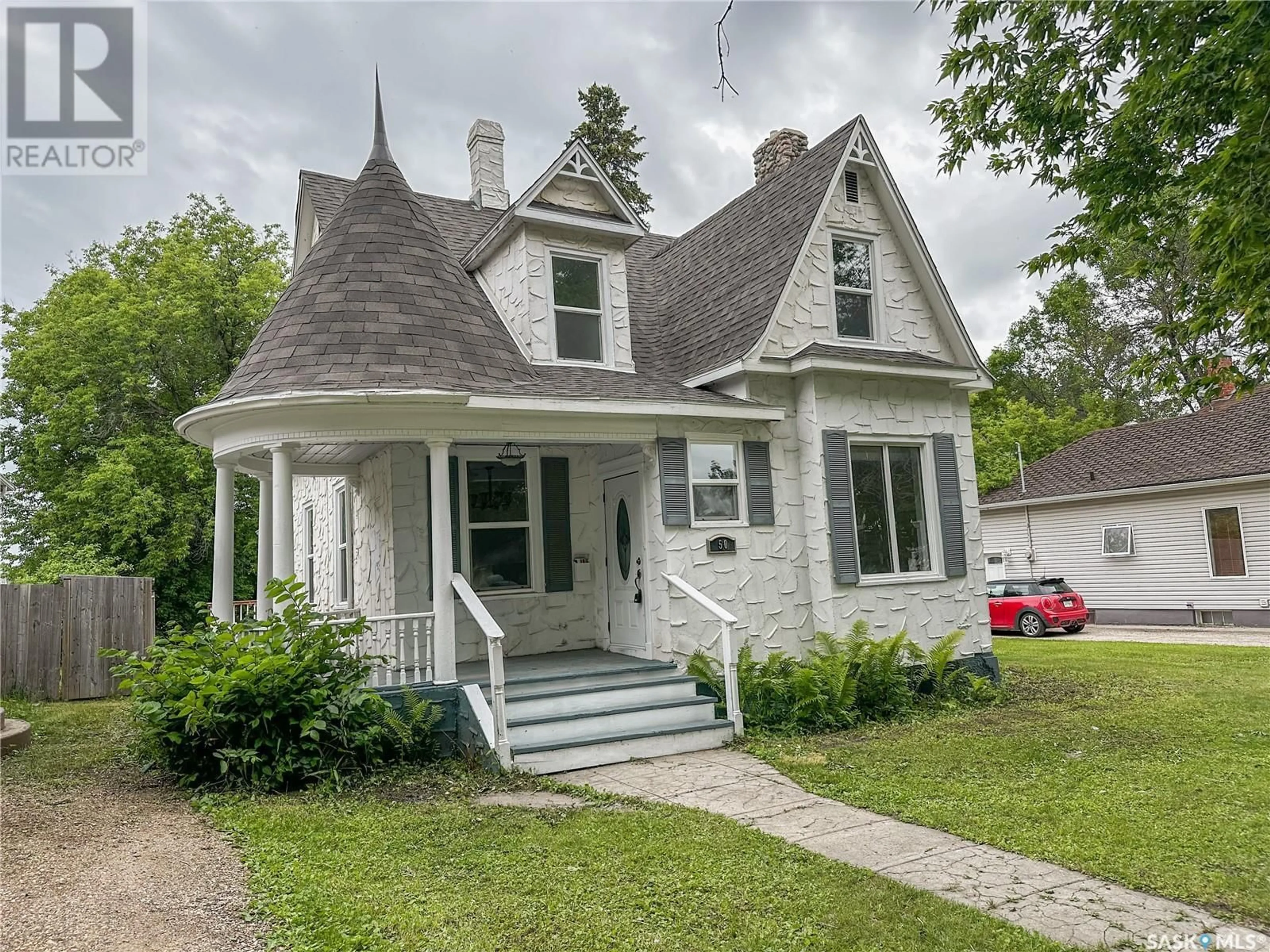 Home with vinyl exterior material, street for 50 ASSINIBOIA AVENUE, Yorkton Saskatchewan S3N1N6