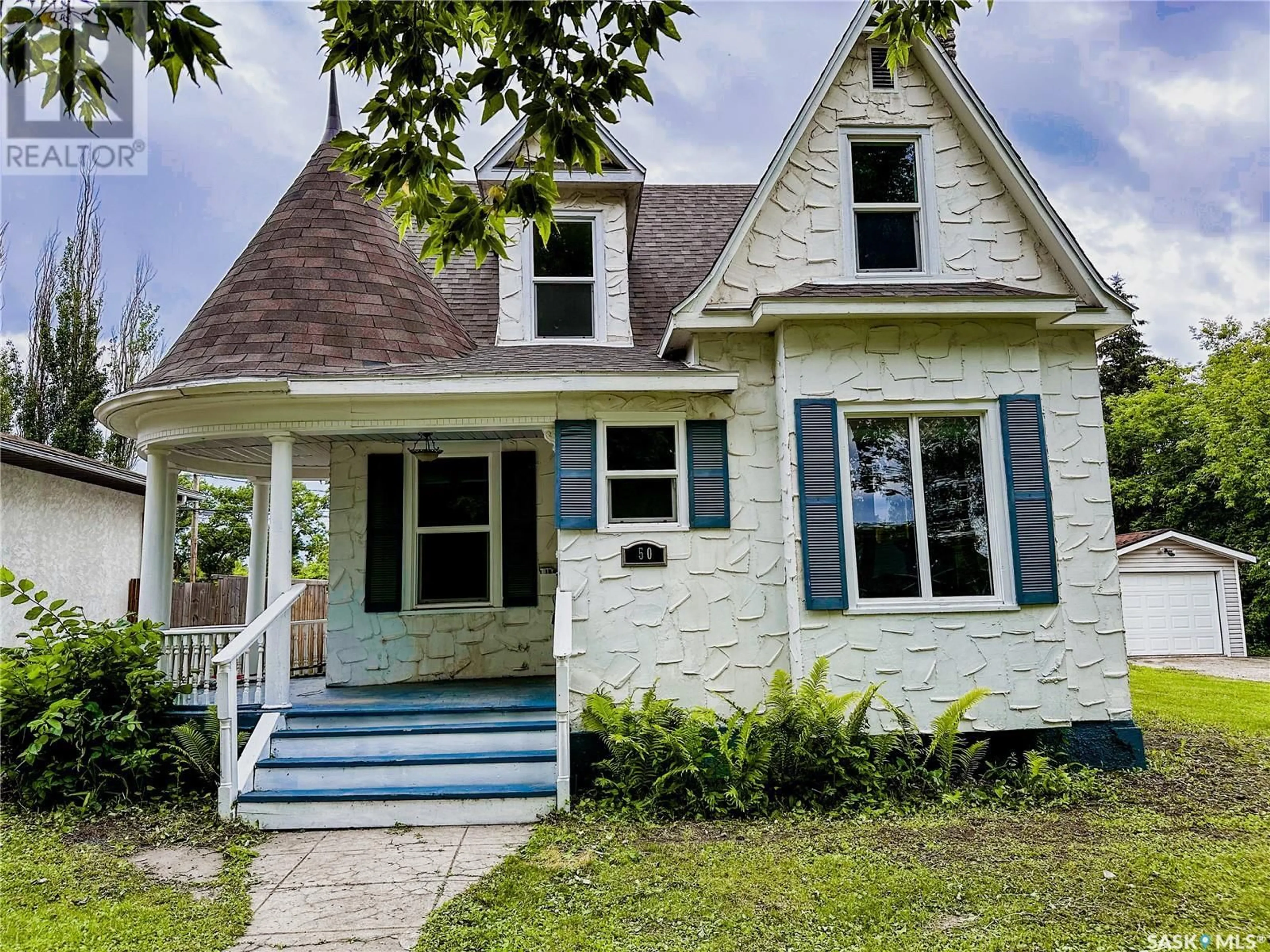 Home with vinyl exterior material, street for 50 ASSINIBOIA AVENUE, Yorkton Saskatchewan S3N1N6