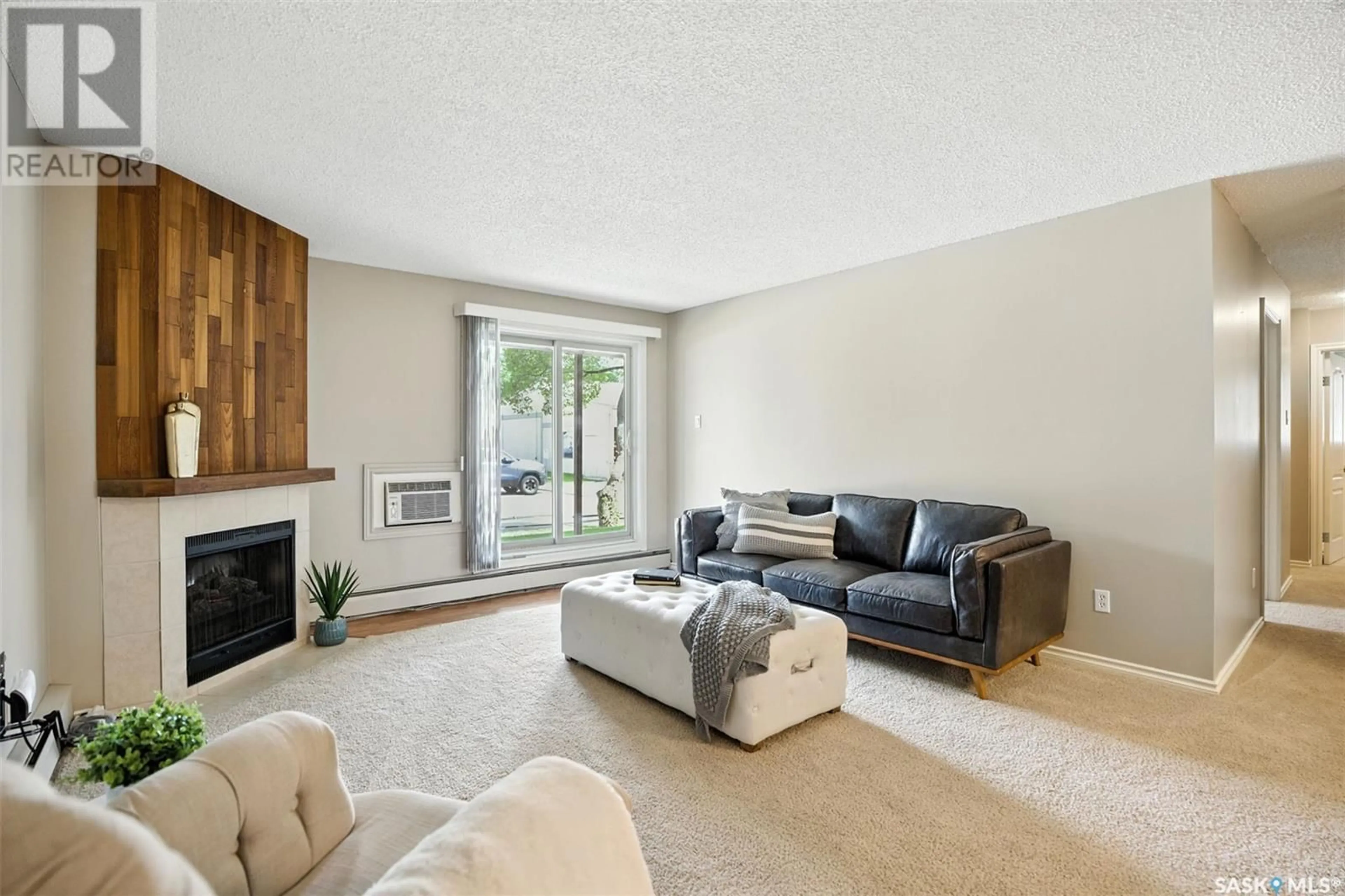 Living room with furniture, unknown for 105A1 - 1121 MCKERCHER DRIVE, Saskatoon Saskatchewan S7H5K9