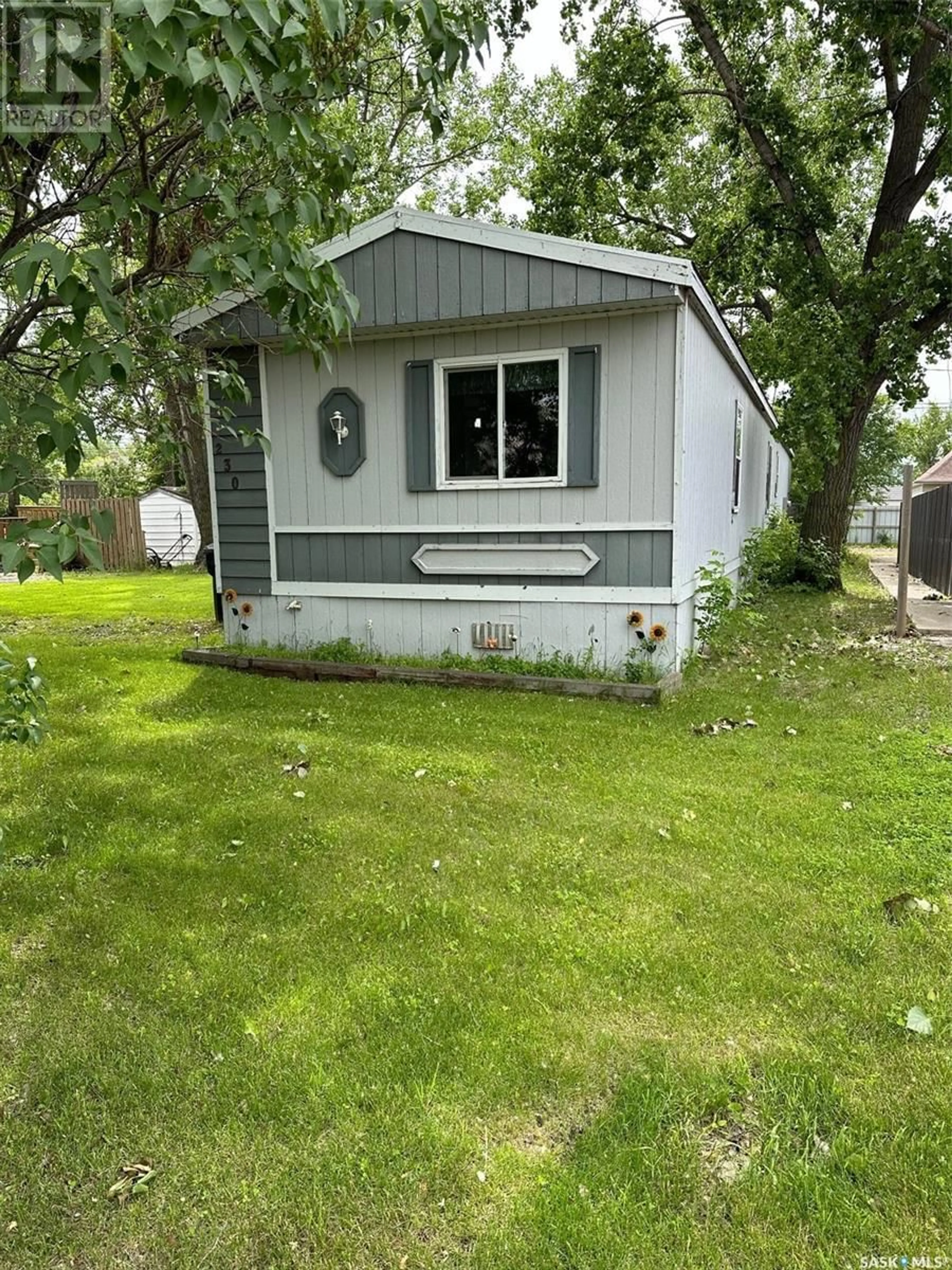 Home with vinyl exterior material, street for 230 MAIN STREET, Bienfait Saskatchewan S0C0M0