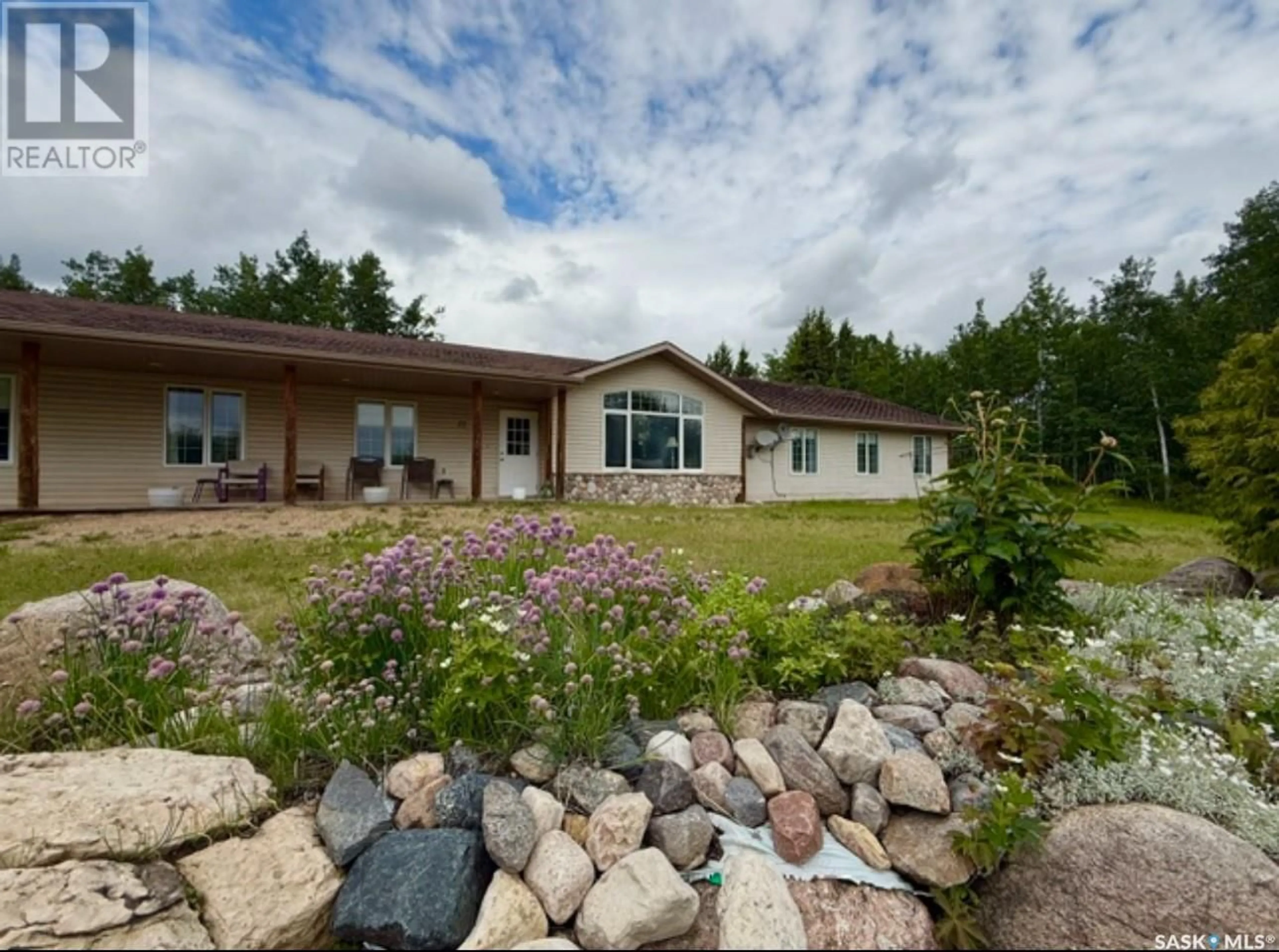 A pic from outside/outdoor area/front of a property/back of a property/a pic from drone, unknown for 25 SOUTHRIDGE DRIVE, Christopher Lake Saskatchewan S0J0N0