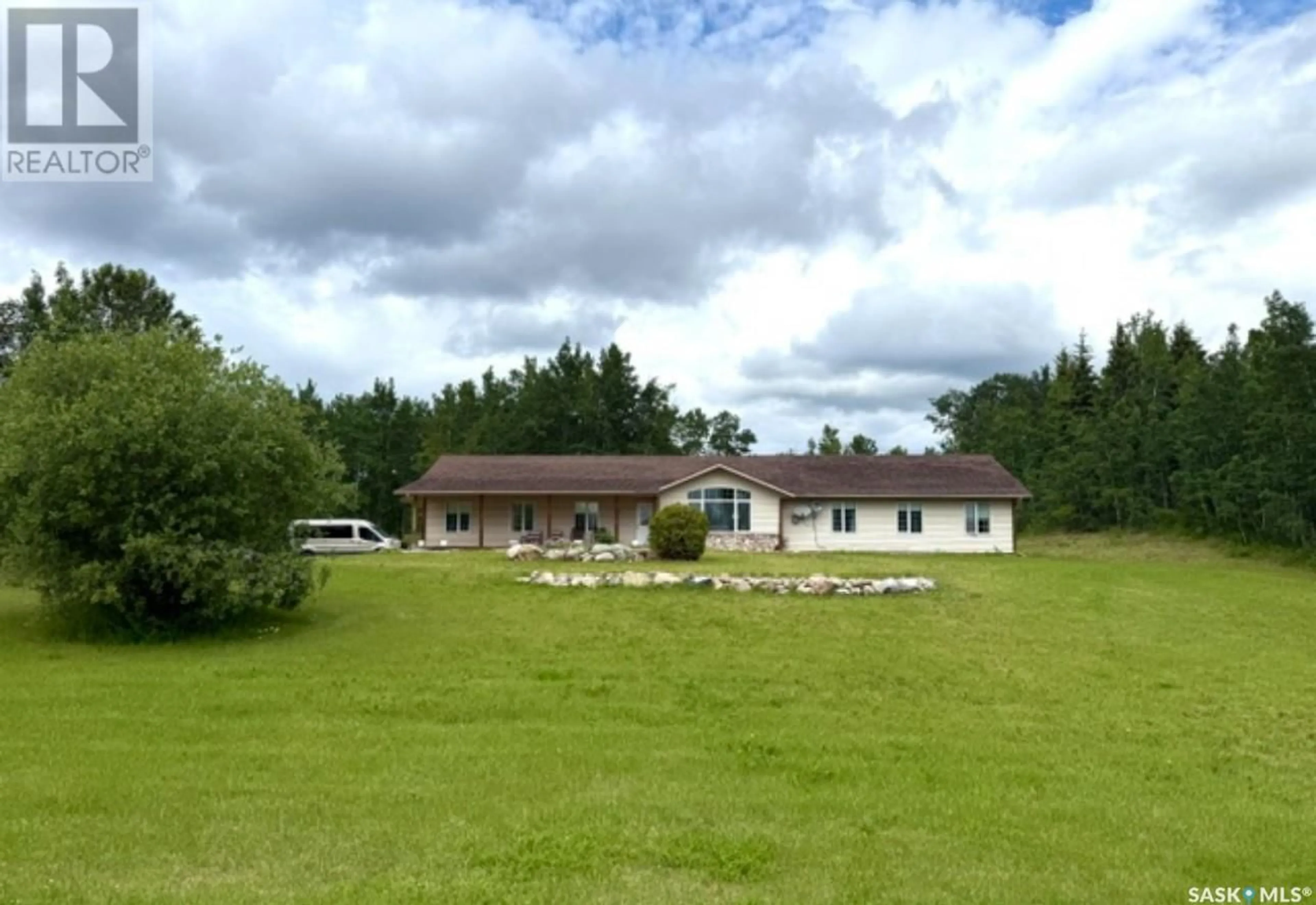 A pic from outside/outdoor area/front of a property/back of a property/a pic from drone, building for 25 SOUTHRIDGE DRIVE, Christopher Lake Saskatchewan S0J0N0