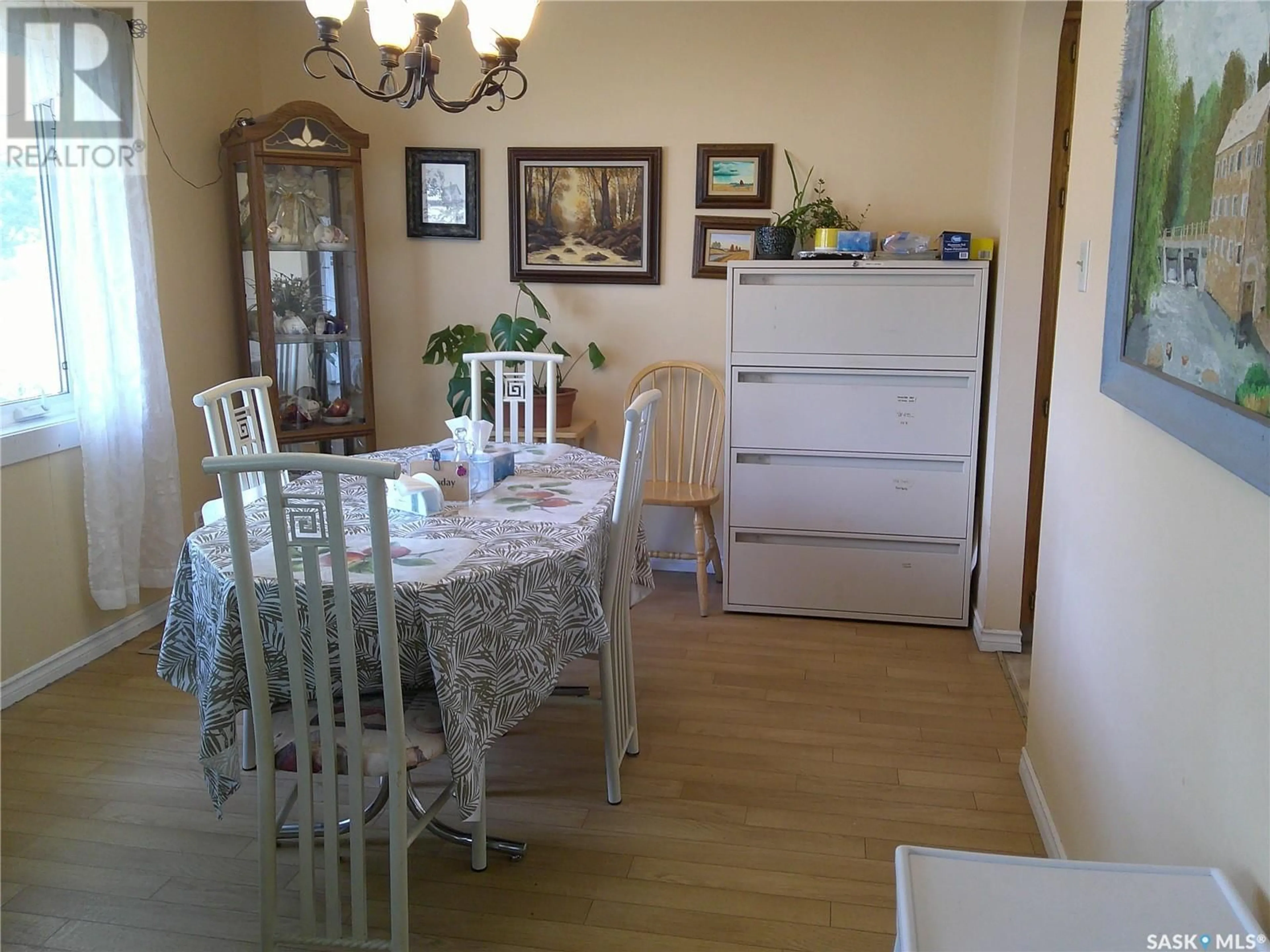 Dining room, wood/laminate floor for 7103 SHERWOOD DRIVE, Regina Saskatchewan S4X2V5