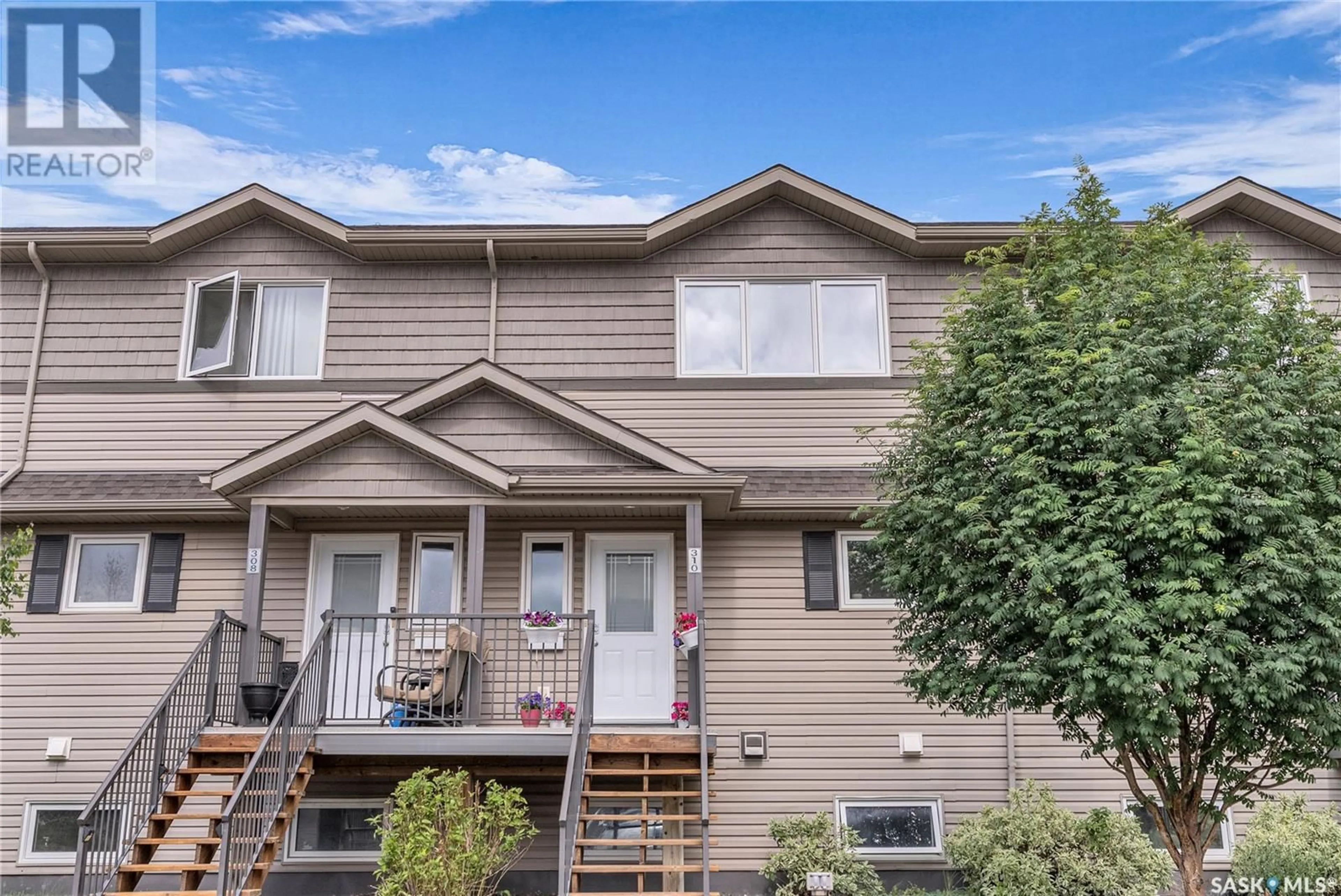 Home with vinyl exterior material, street for 310 - 1303 RICHARDSON ROAD, Saskatoon Saskatchewan S7R0L1