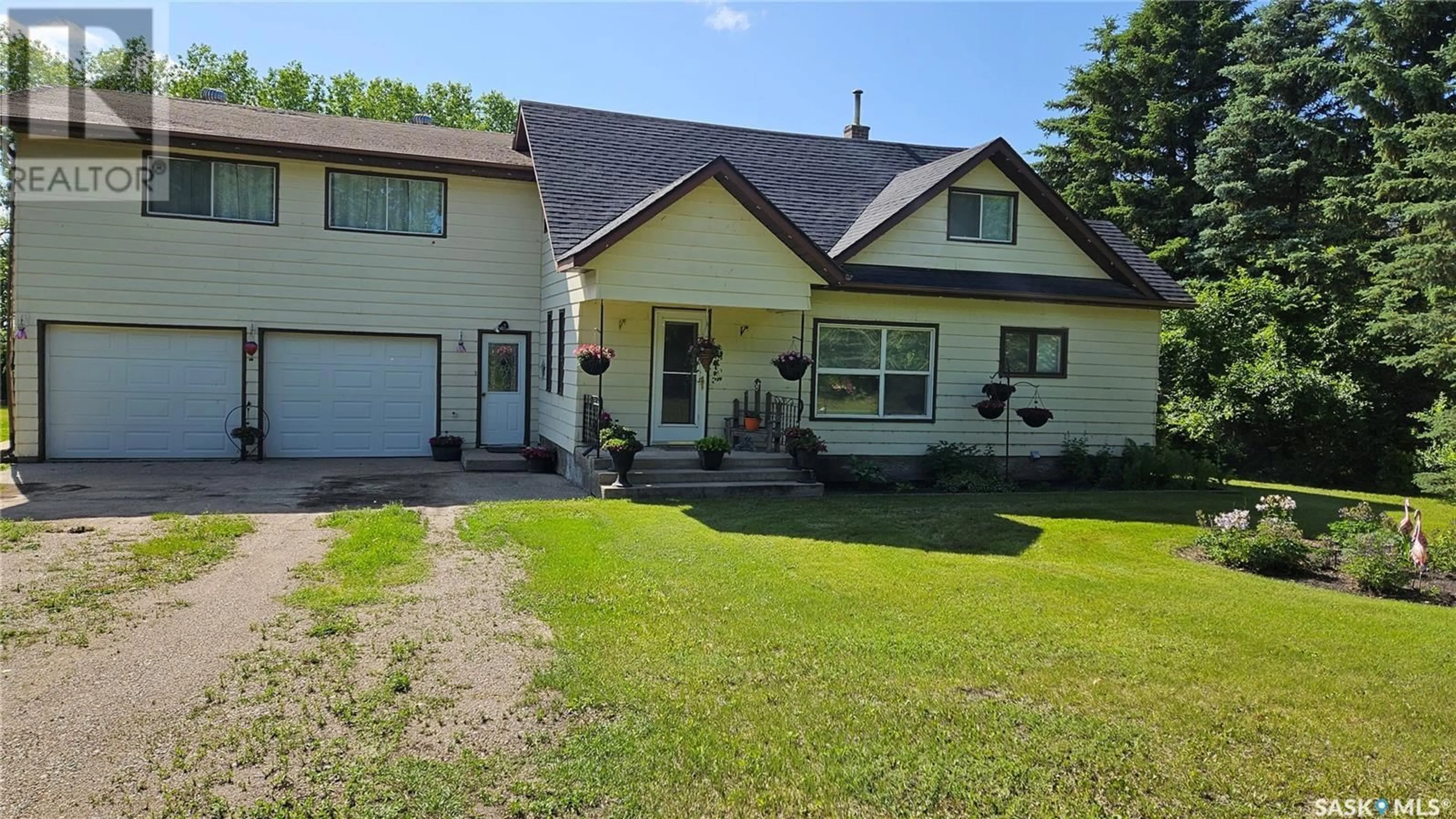 Home with vinyl exterior material, street for HUMBOLDT ACREAGE, Humboldt Rm No. 370 Saskatchewan S0K2A0