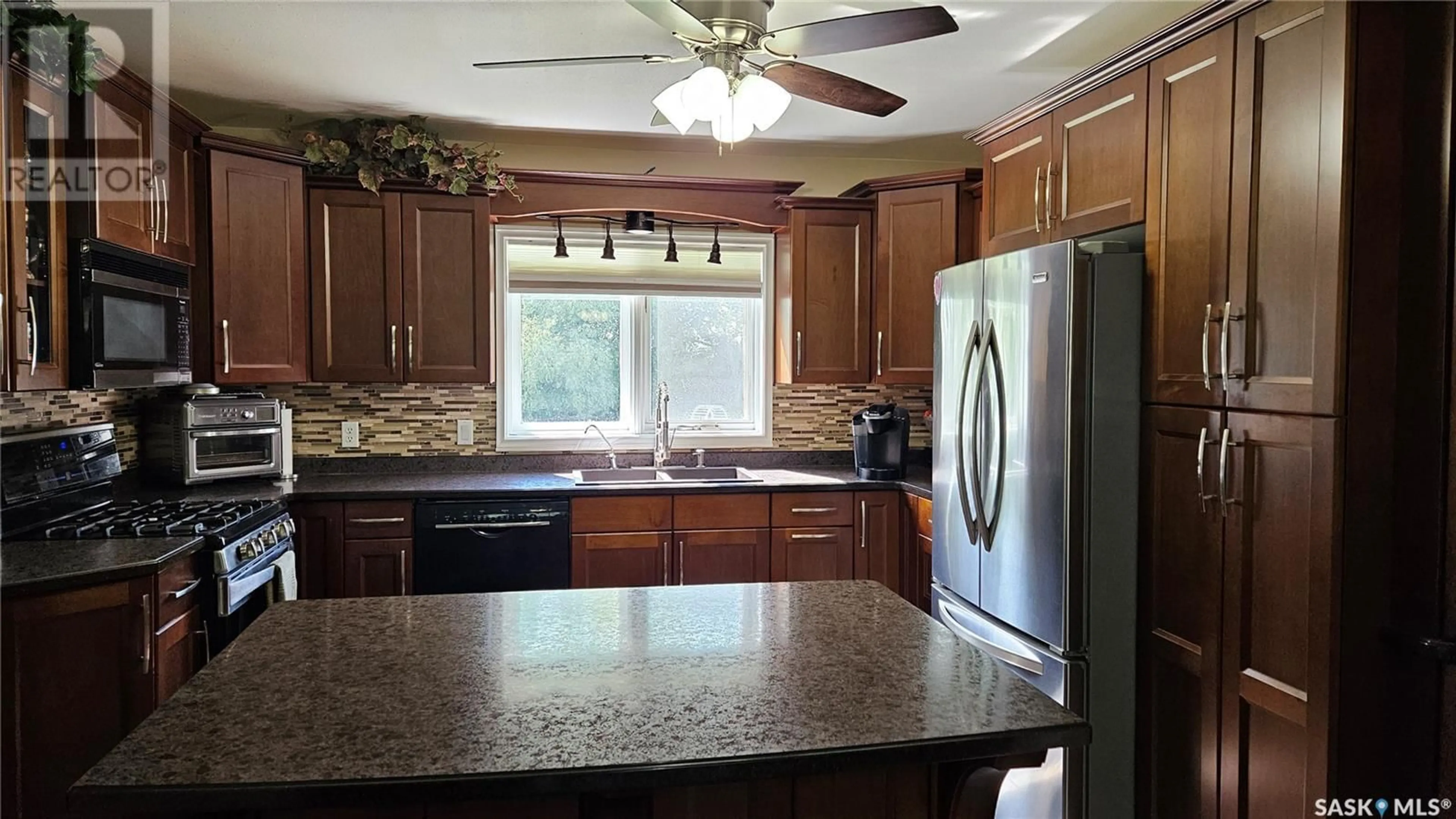 Open concept kitchen, ceramic/tile floor for HUMBOLDT ACREAGE, Humboldt Rm No. 370 Saskatchewan S0K2A0