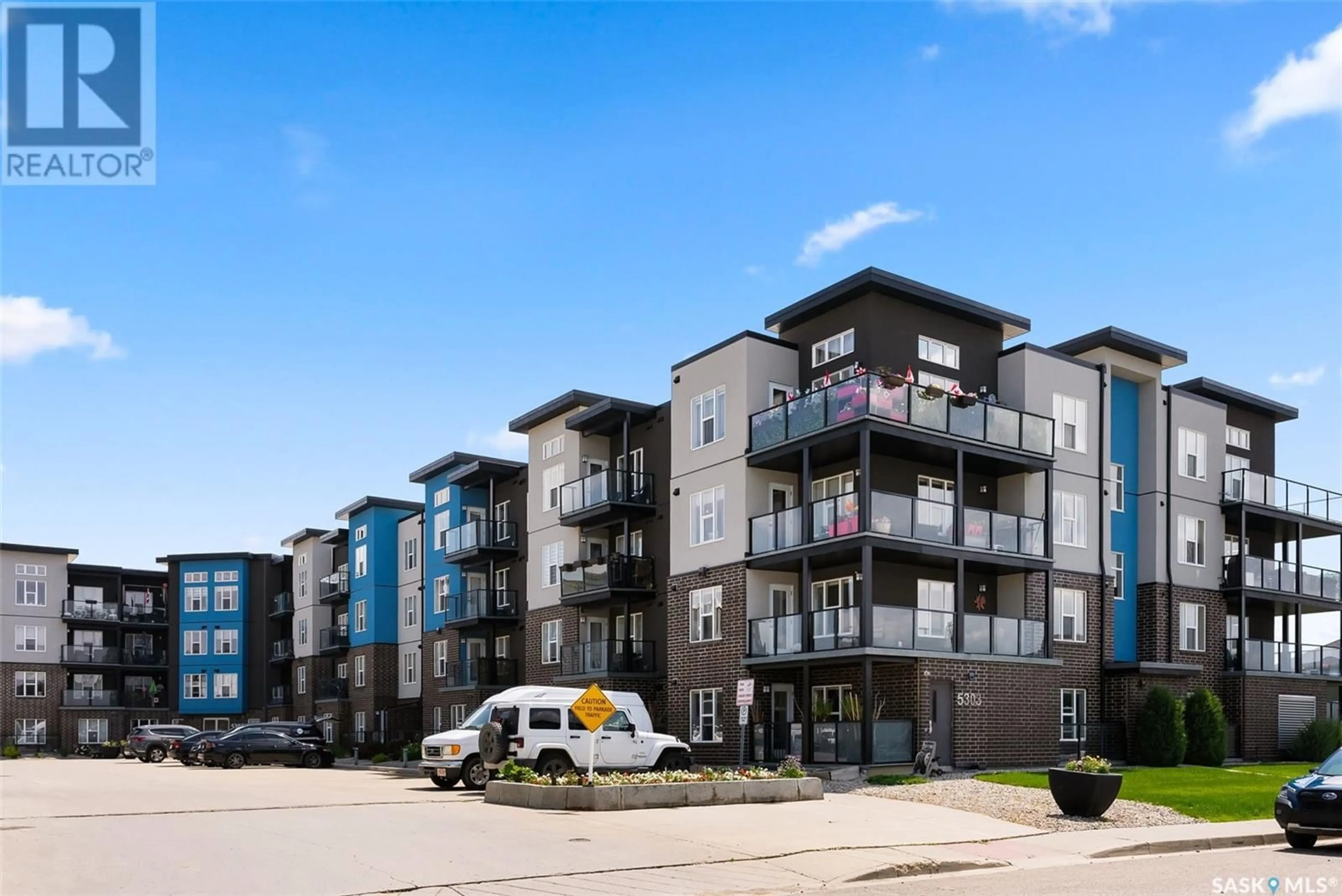 A pic from outside/outdoor area/front of a property/back of a property/a pic from drone, unknown for 422 5303 UNIVERSAL CRESCENT, Regina Saskatchewan S4W0L1