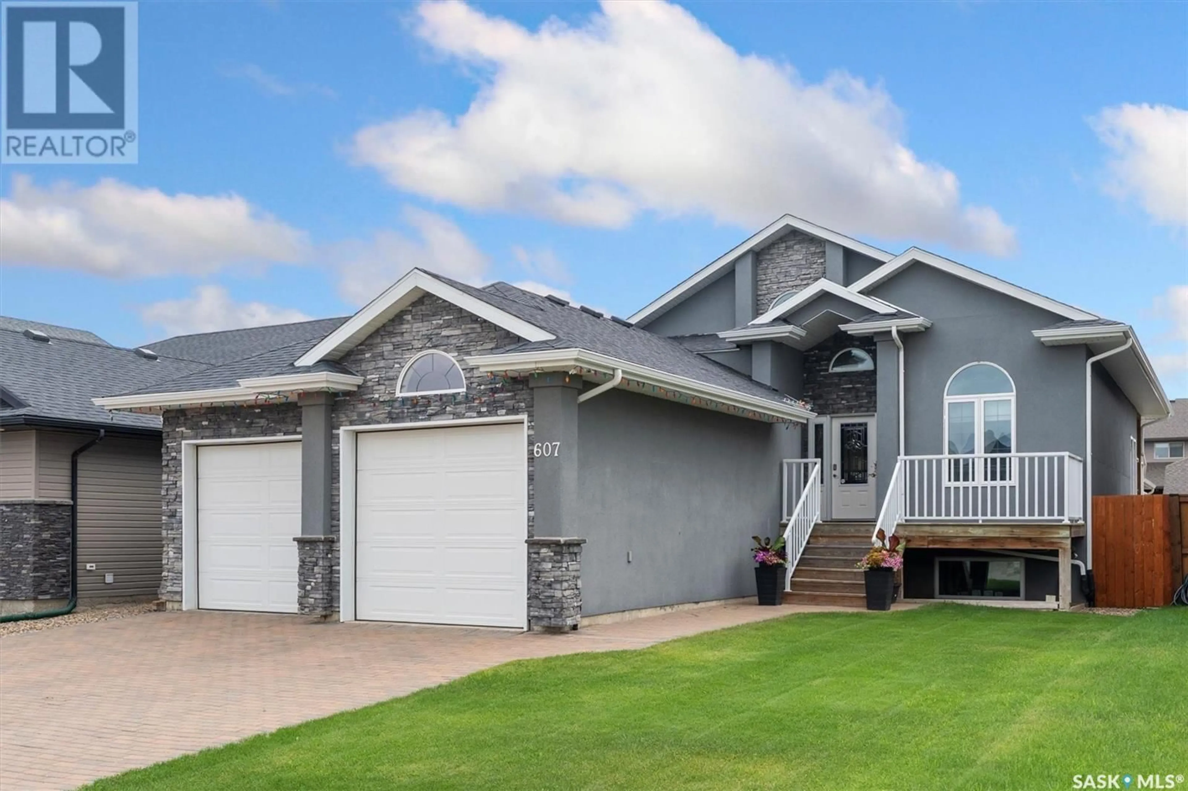 Home with vinyl exterior material, street for 607 WERSCHNER CRESCENT, Saskatoon Saskatchewan S7V0E1