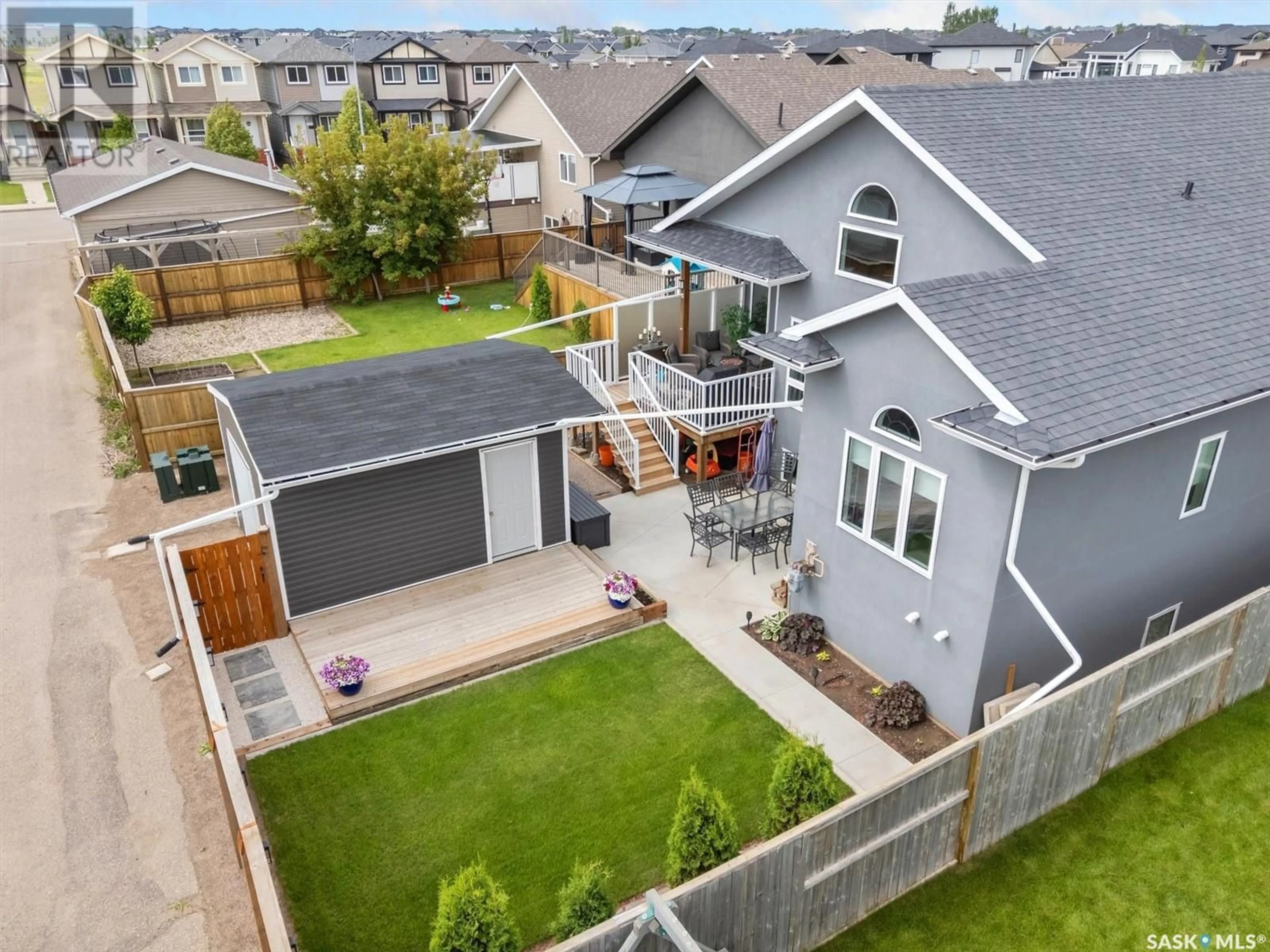 A pic from outside/outdoor area/front of a property/back of a property/a pic from drone, street for 607 WERSCHNER CRESCENT, Saskatoon Saskatchewan S7V0E1