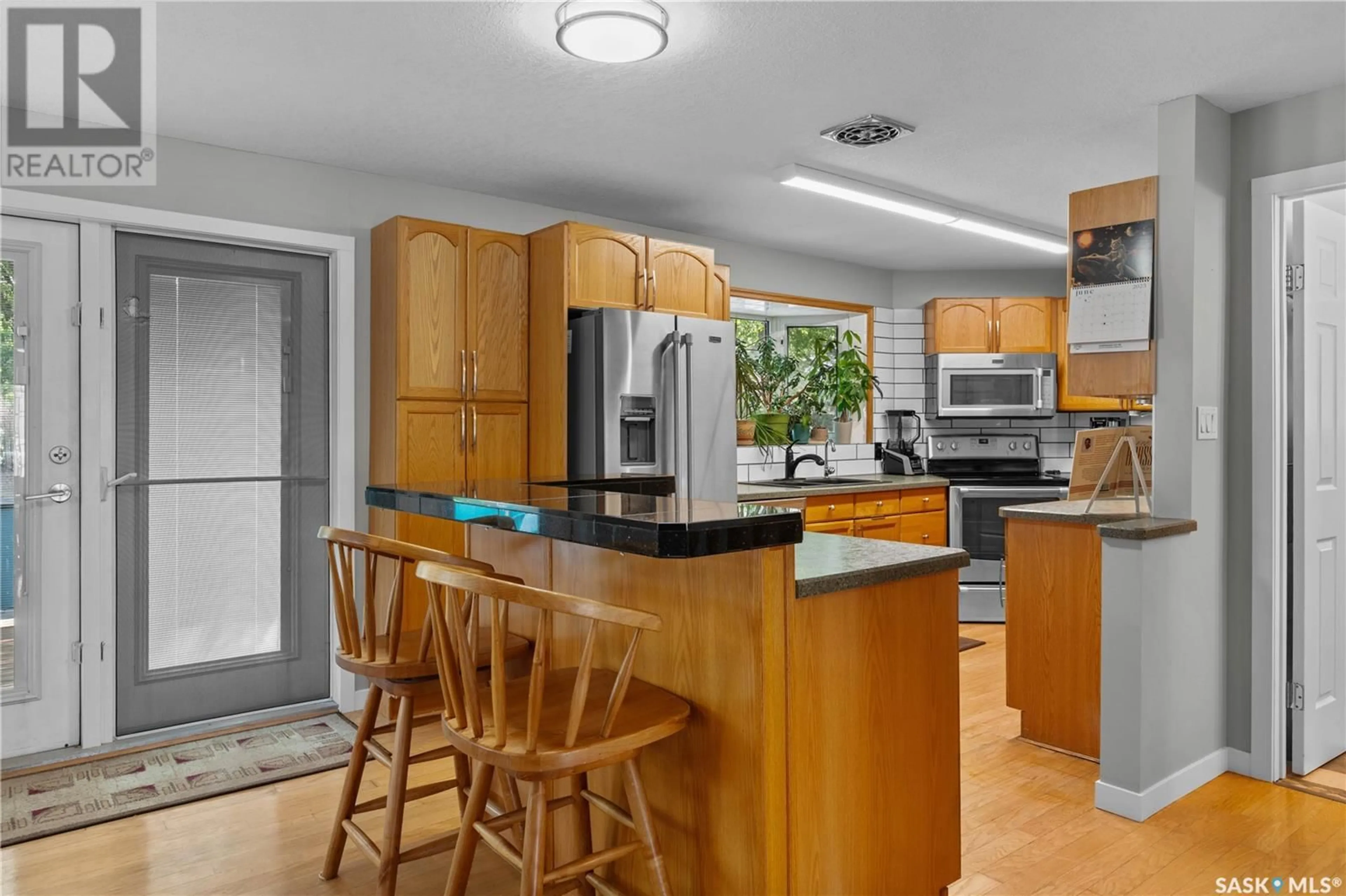 Open concept kitchen, unknown for 2440 FRANCIS STREET, Regina Saskatchewan S4N2P9