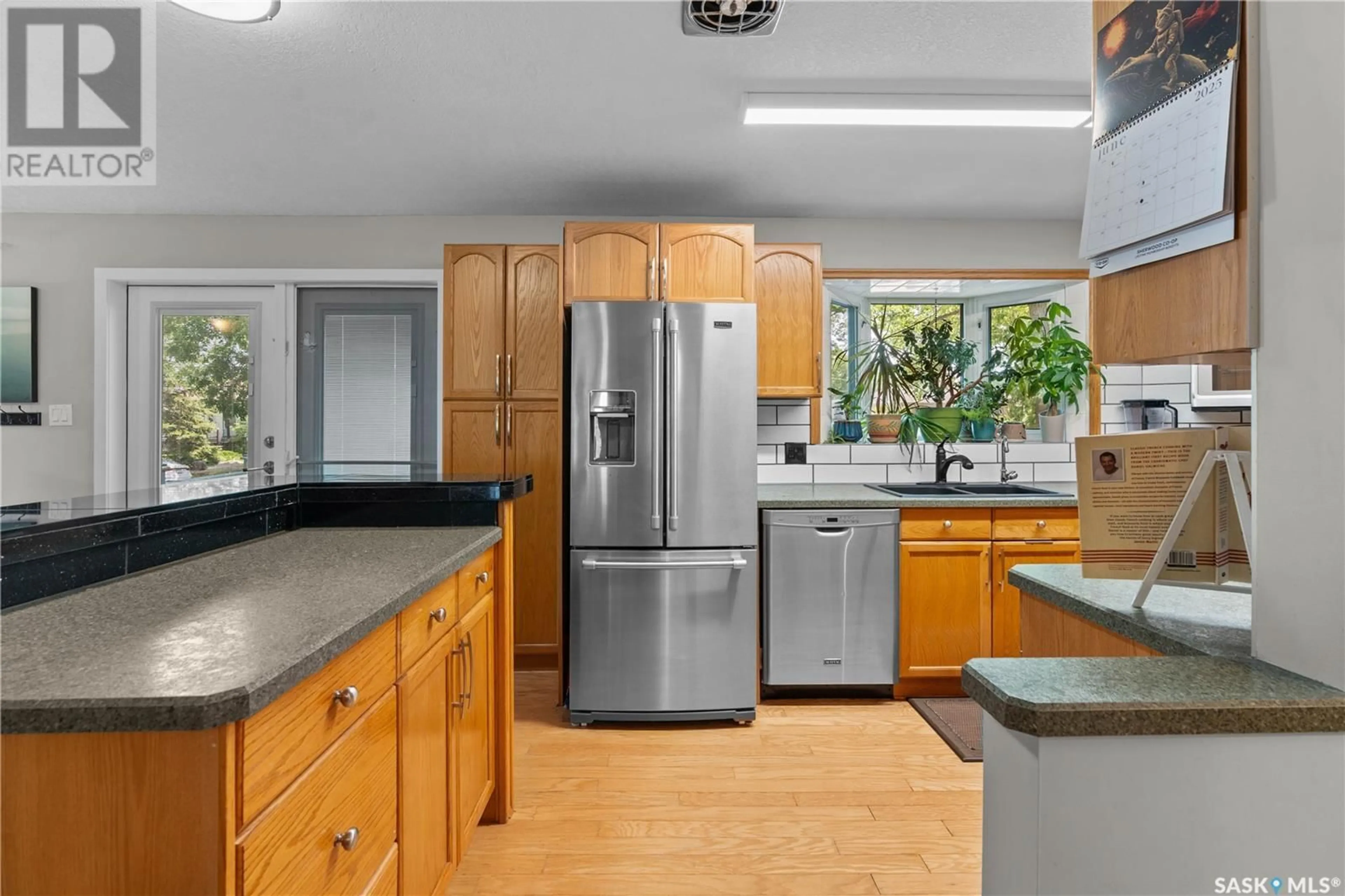 Open concept kitchen, unknown for 2440 FRANCIS STREET, Regina Saskatchewan S4N2P9