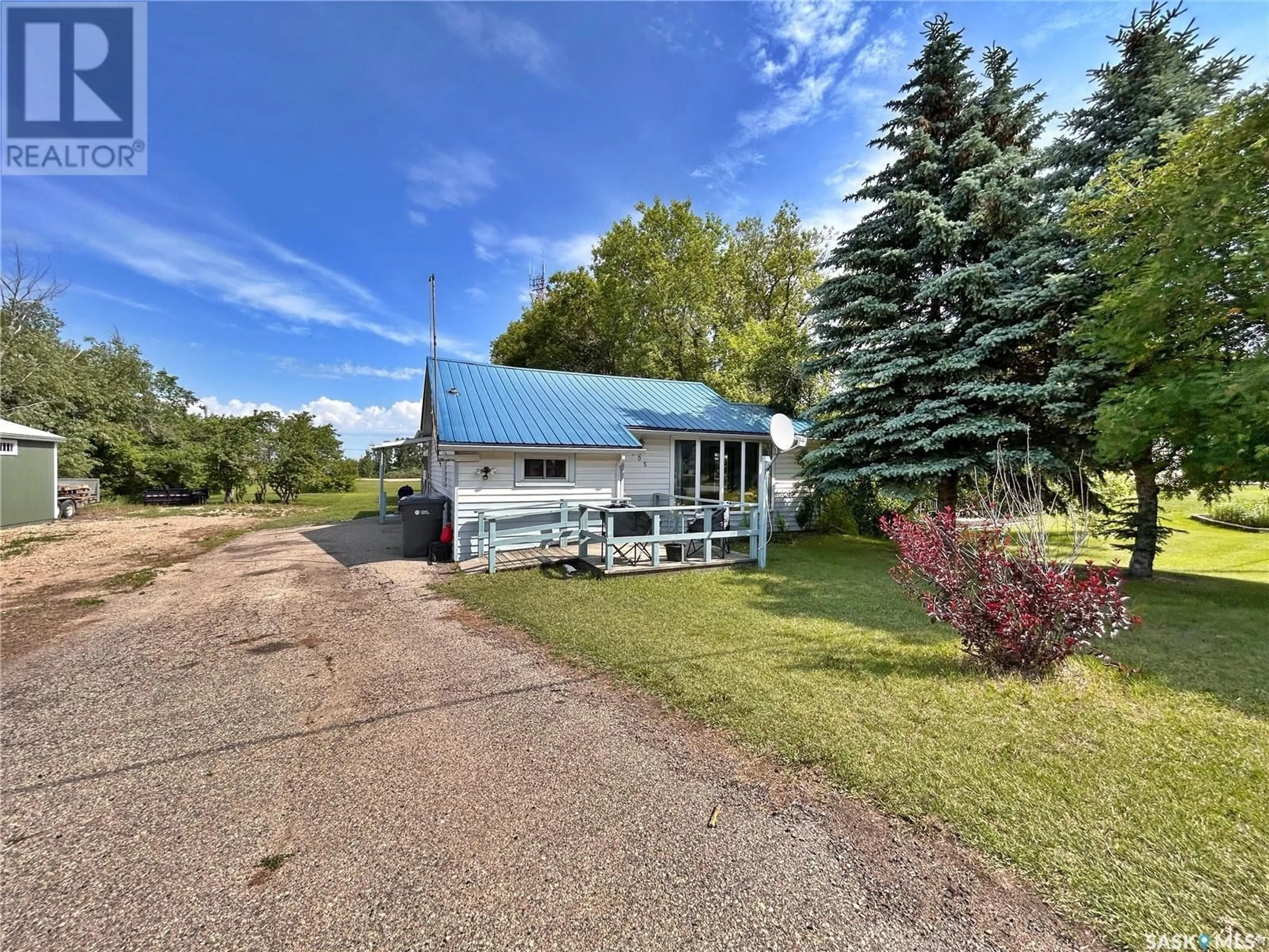 A pic from outside/outdoor area/front of a property/back of a property/a pic from drone, unknown for 105 PIPESTONE AVENUE, Wawota Saskatchewan S0G5A0