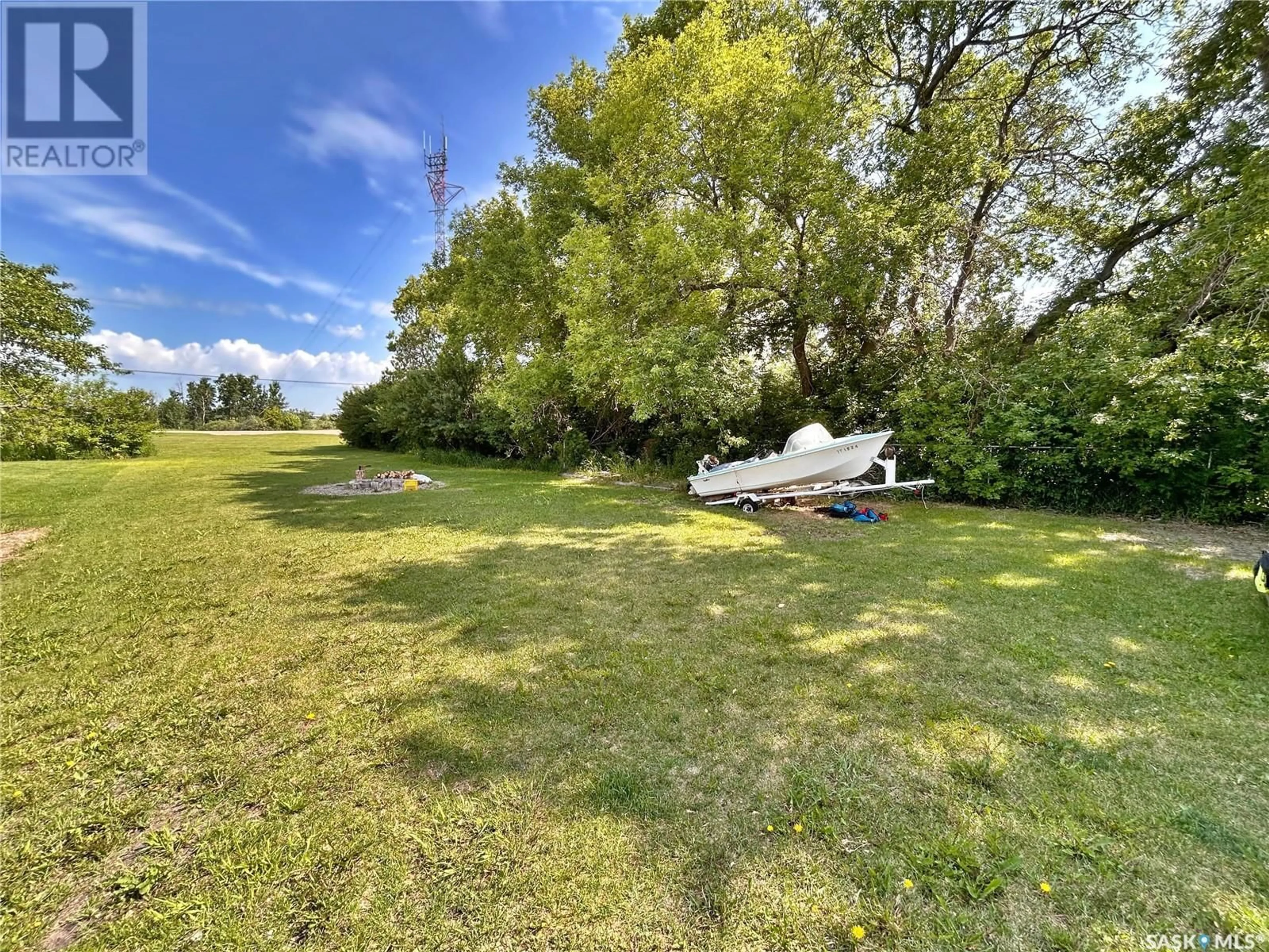 A pic from outside/outdoor area/front of a property/back of a property/a pic from drone, water/lake/river/ocean view for 105 PIPESTONE AVENUE, Wawota Saskatchewan S0G5A0