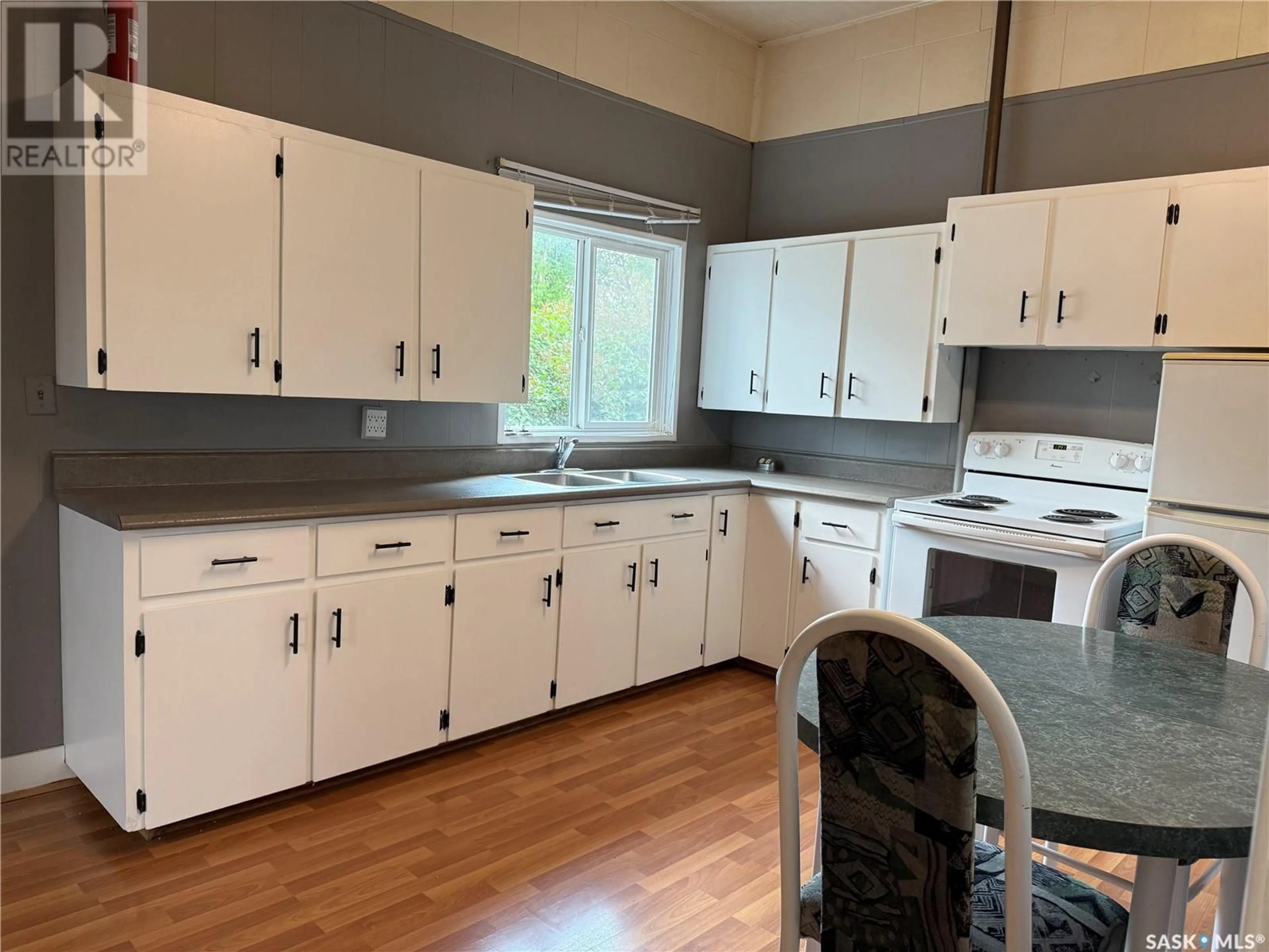 Standard kitchen, wood/laminate floor for 303 1ST STREET, Meadow Lake Saskatchewan S9X1E7