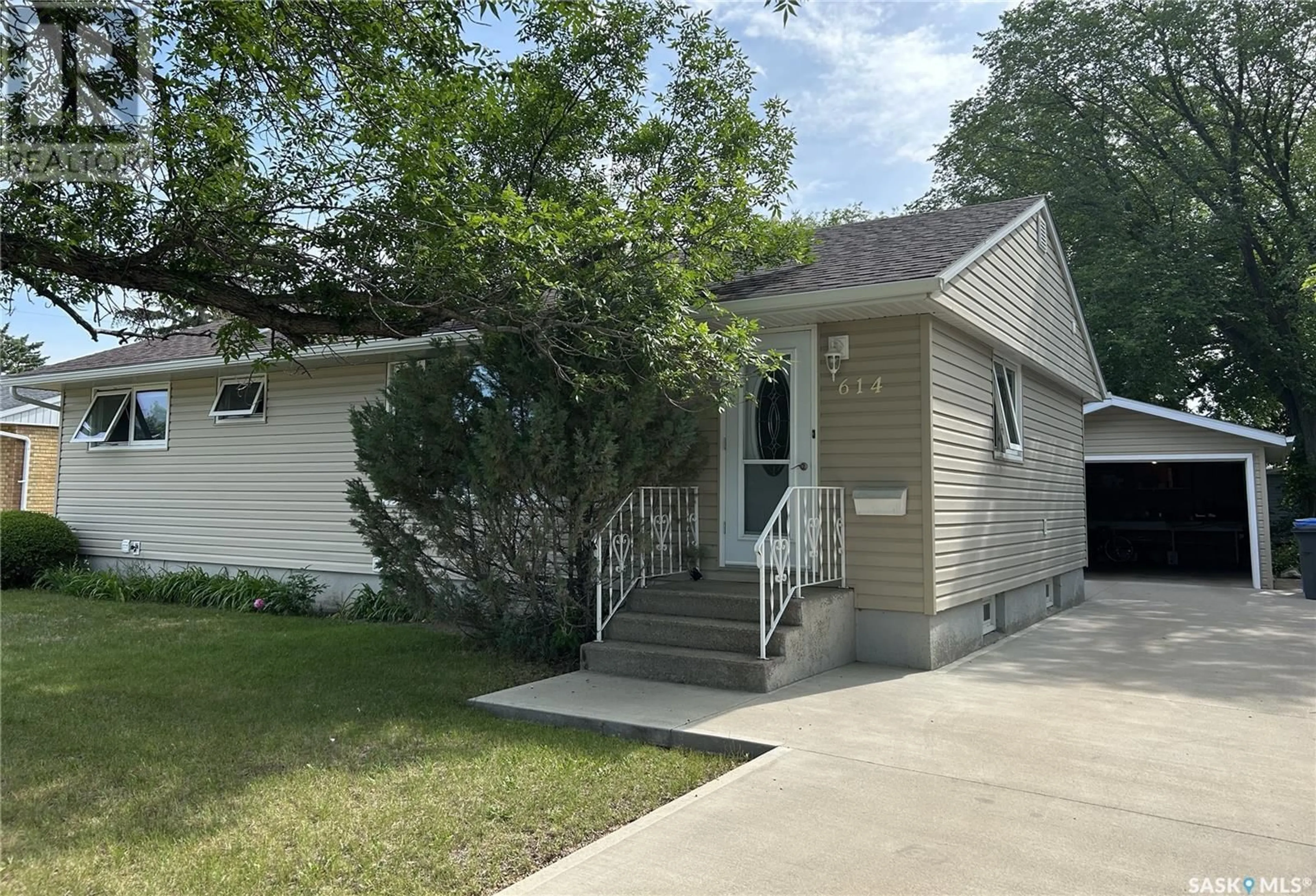 Home with vinyl exterior material, street for 614 ROOKS AVENUE, Estevan Saskatchewan S4A0B3