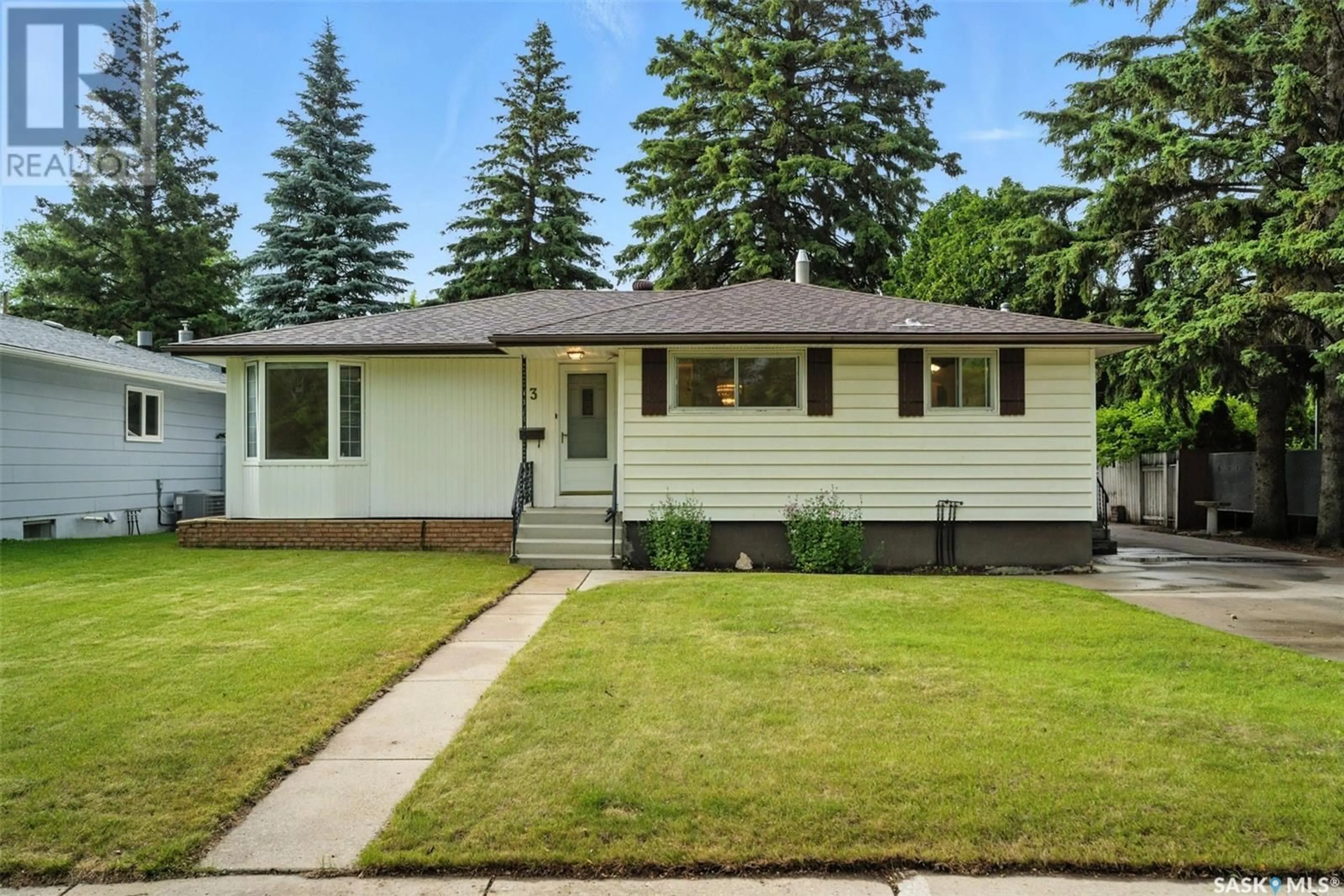 Home with vinyl exterior material, street for 3 JOHN HAIR CRESCENT, Saskatoon Saskatchewan S7J2K6