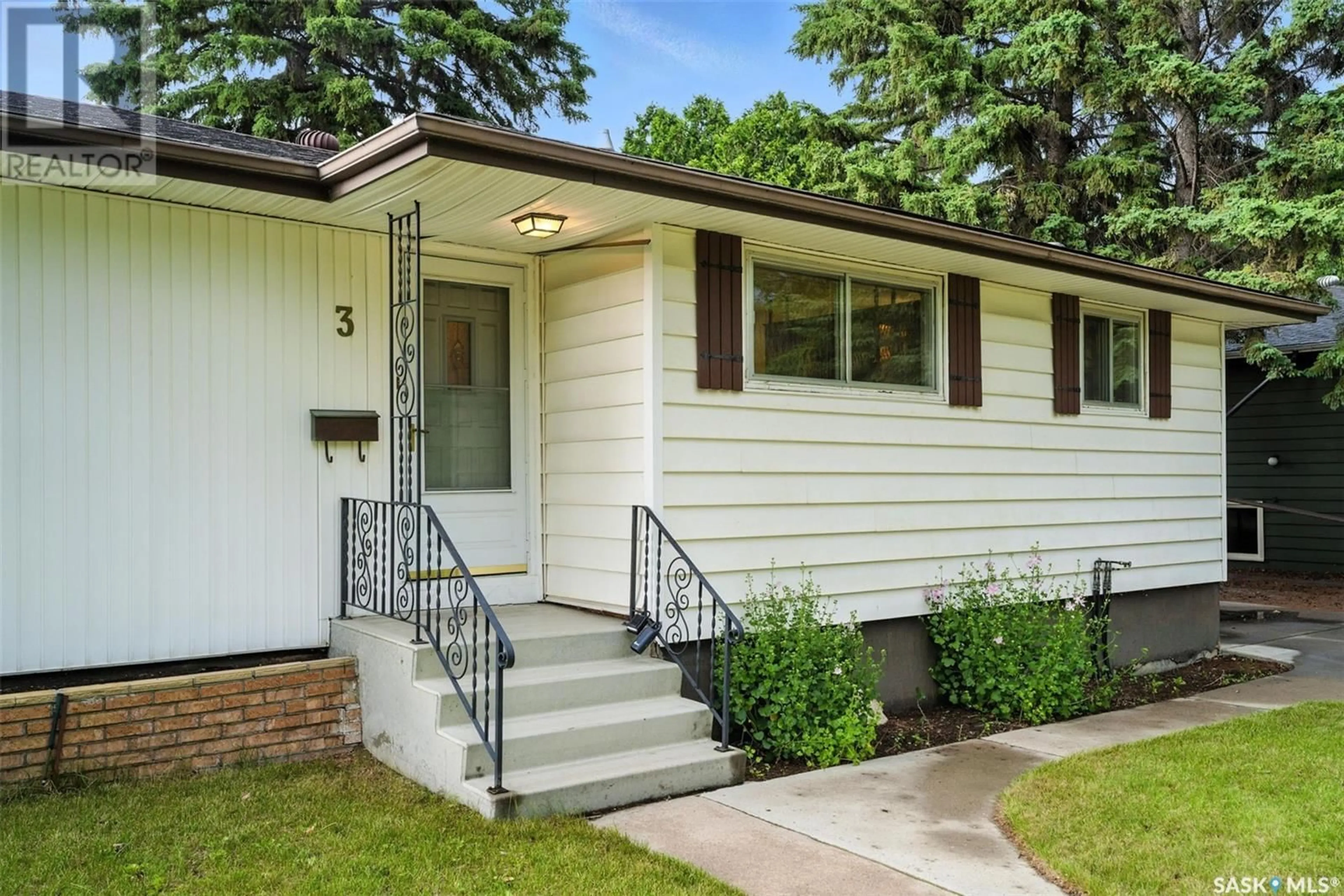Home with vinyl exterior material, street for 3 JOHN HAIR CRESCENT, Saskatoon Saskatchewan S7J2K6