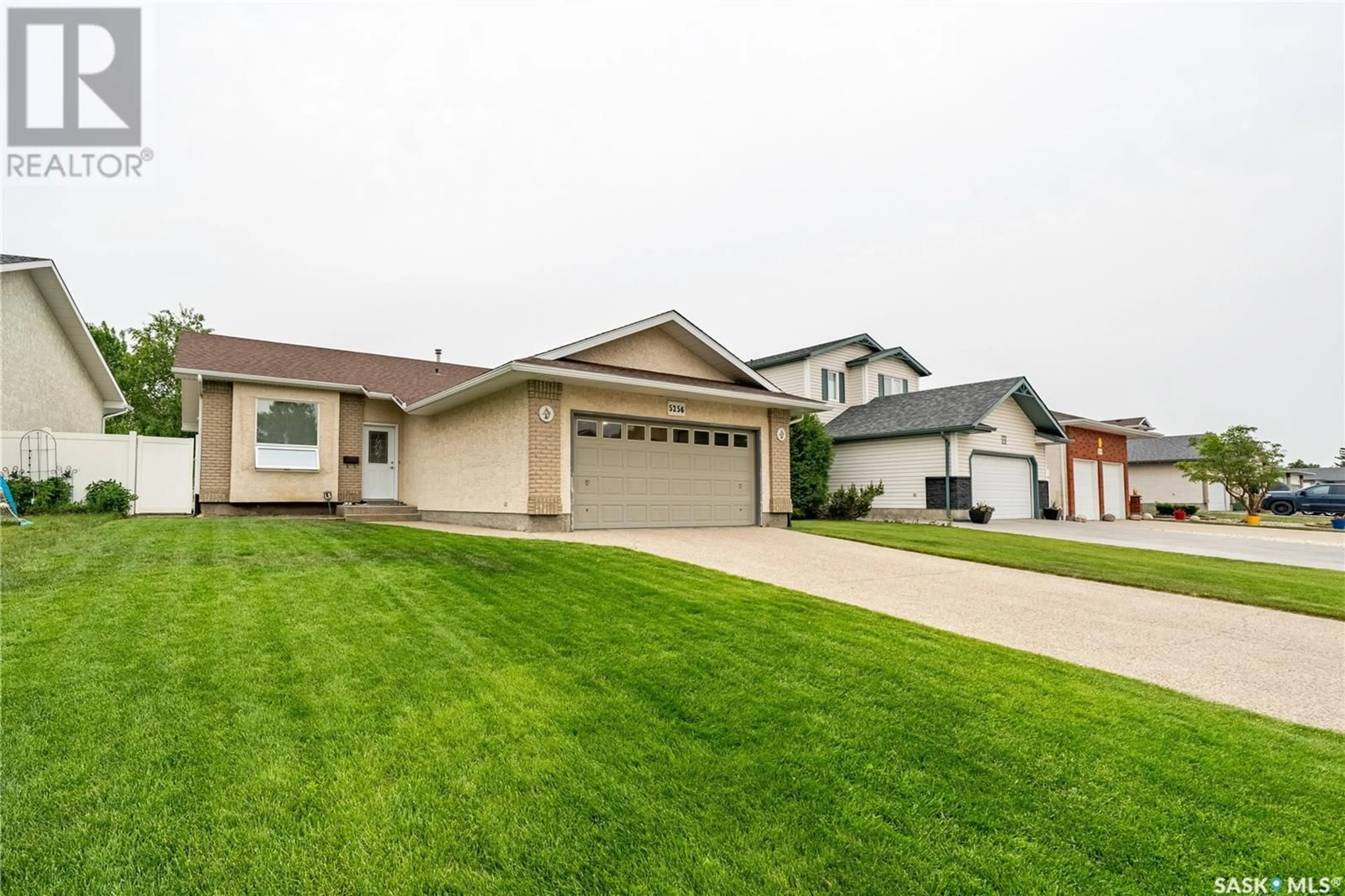 Home with vinyl exterior material, street for 5256 STAFF CRESCENT, Regina Saskatchewan S4X4M2
