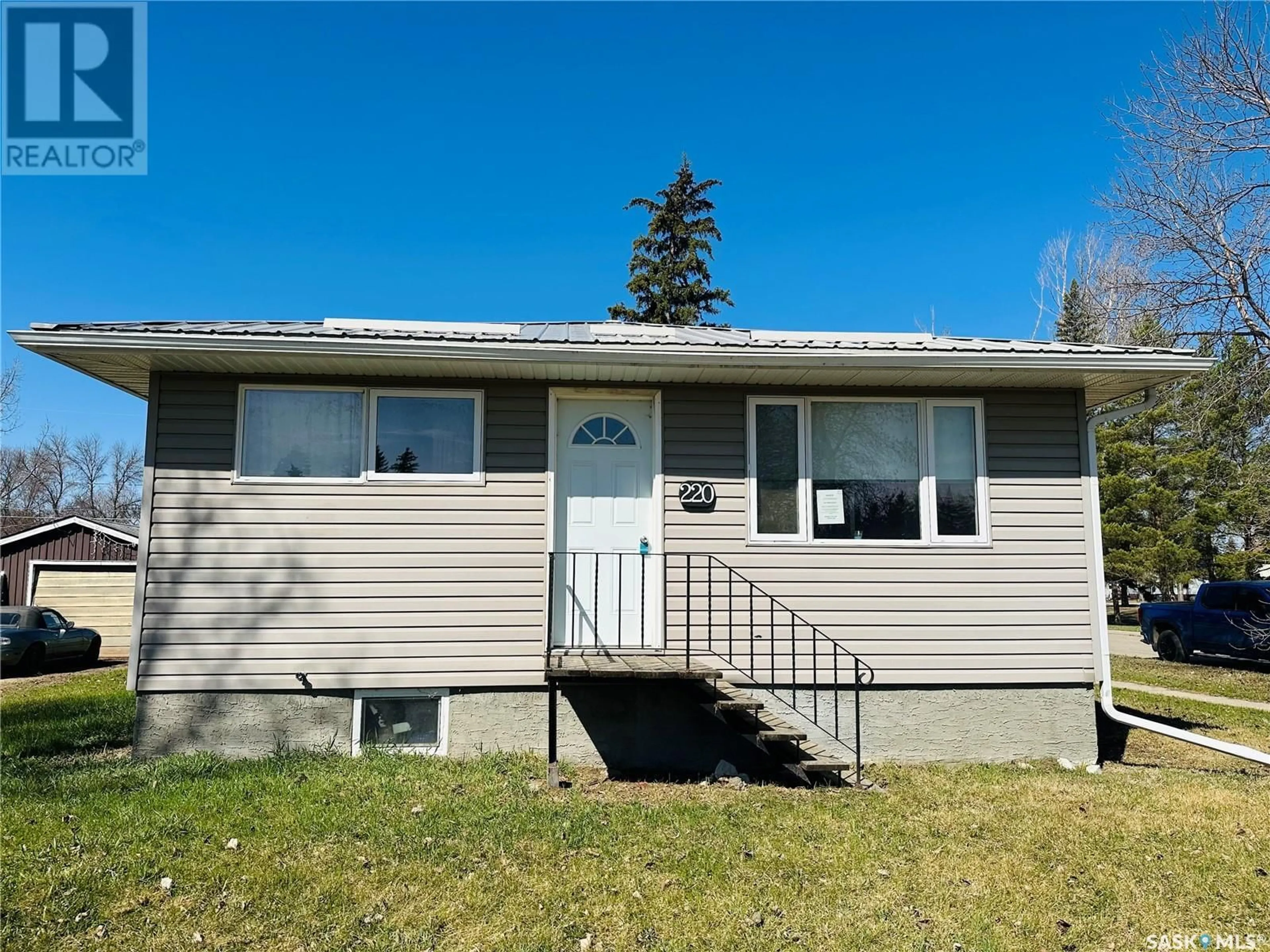 Home with vinyl exterior material, street for 220 MINTO STREET, Cupar Saskatchewan S0G0Y0