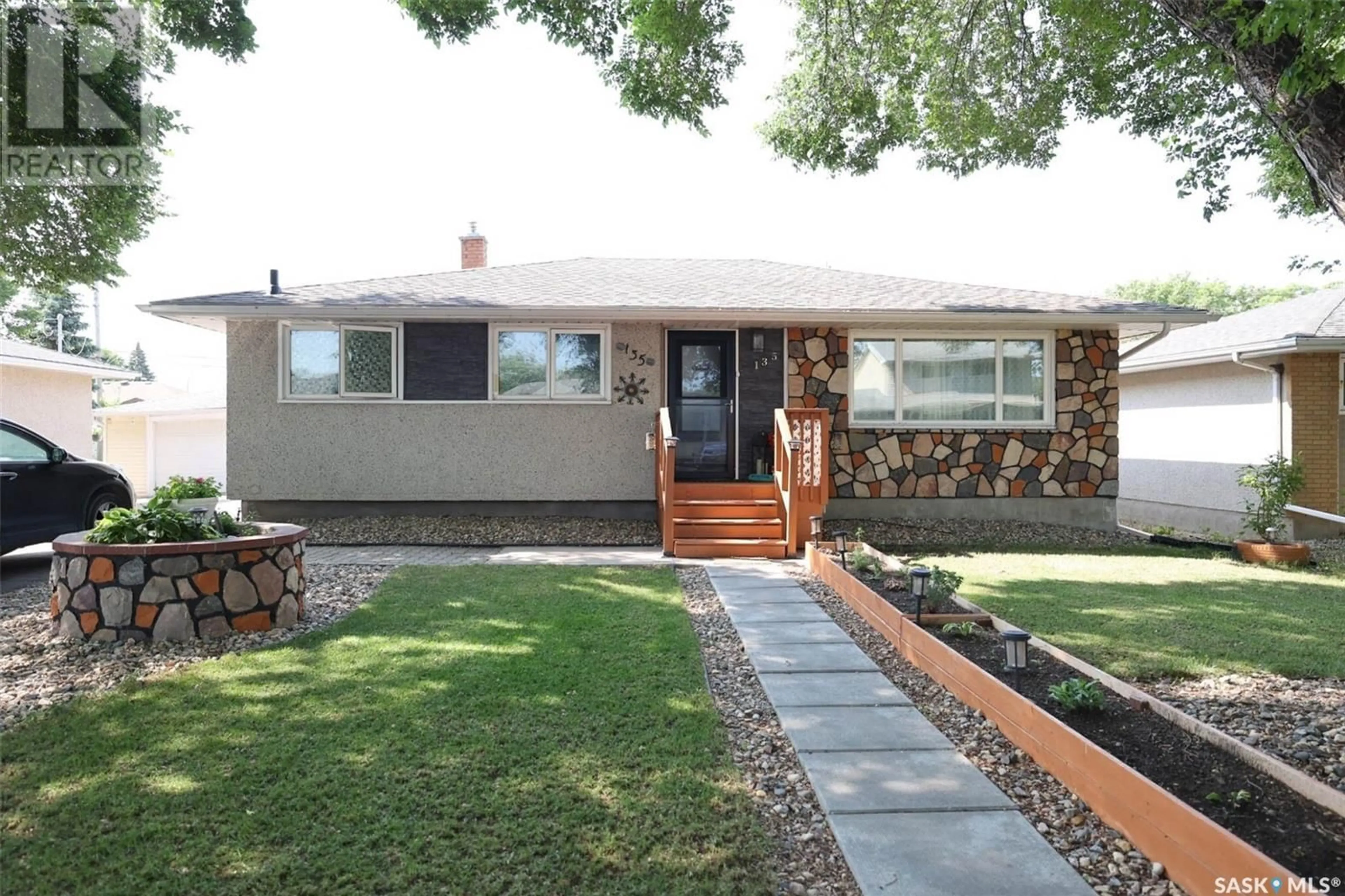 Home with brick exterior material, street for 135 WOODWARD AVENUE, Regina Saskatchewan S4R3H5