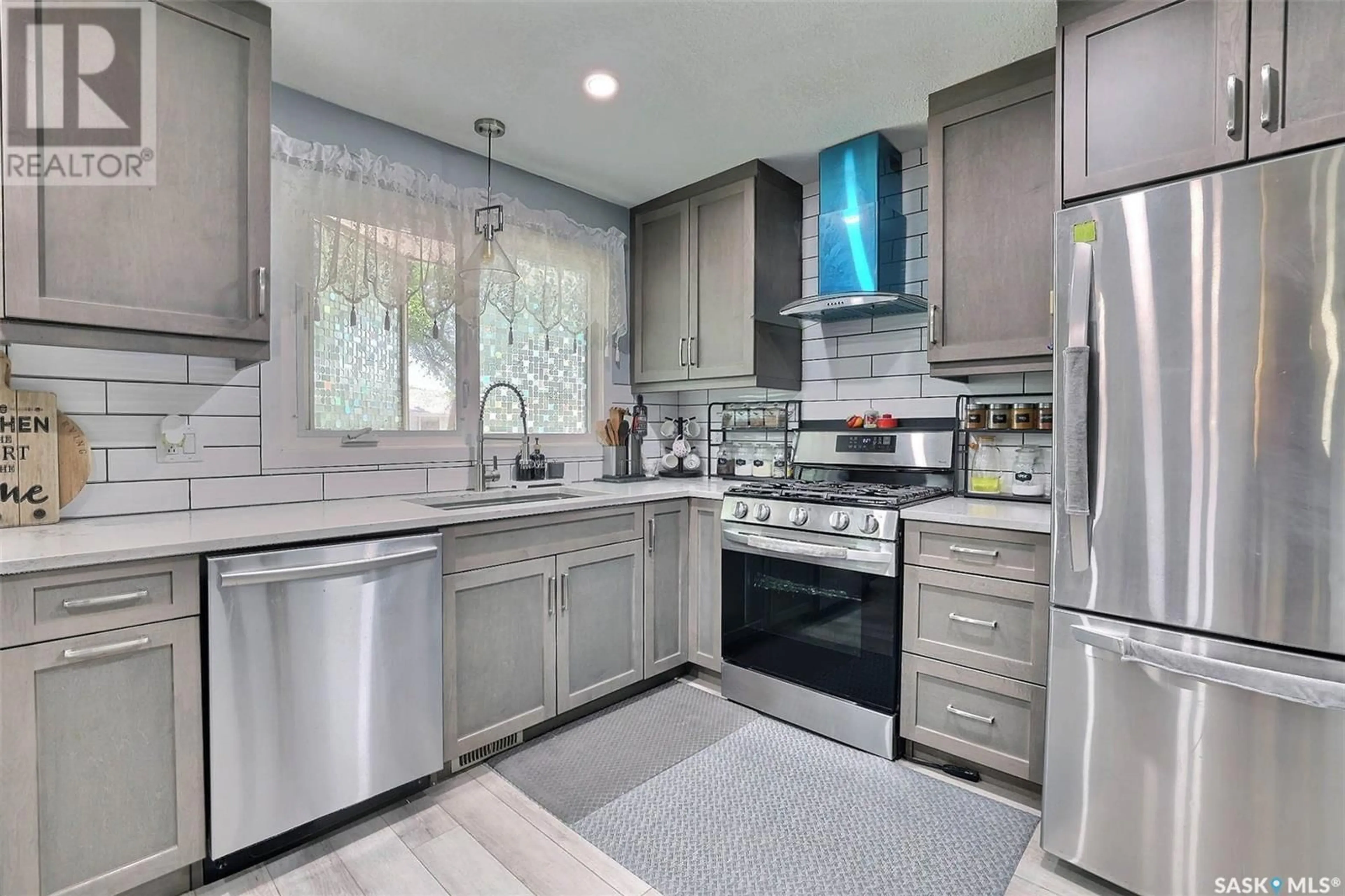 Contemporary kitchen, ceramic/tile floor for 135 WOODWARD AVENUE, Regina Saskatchewan S4R3H5