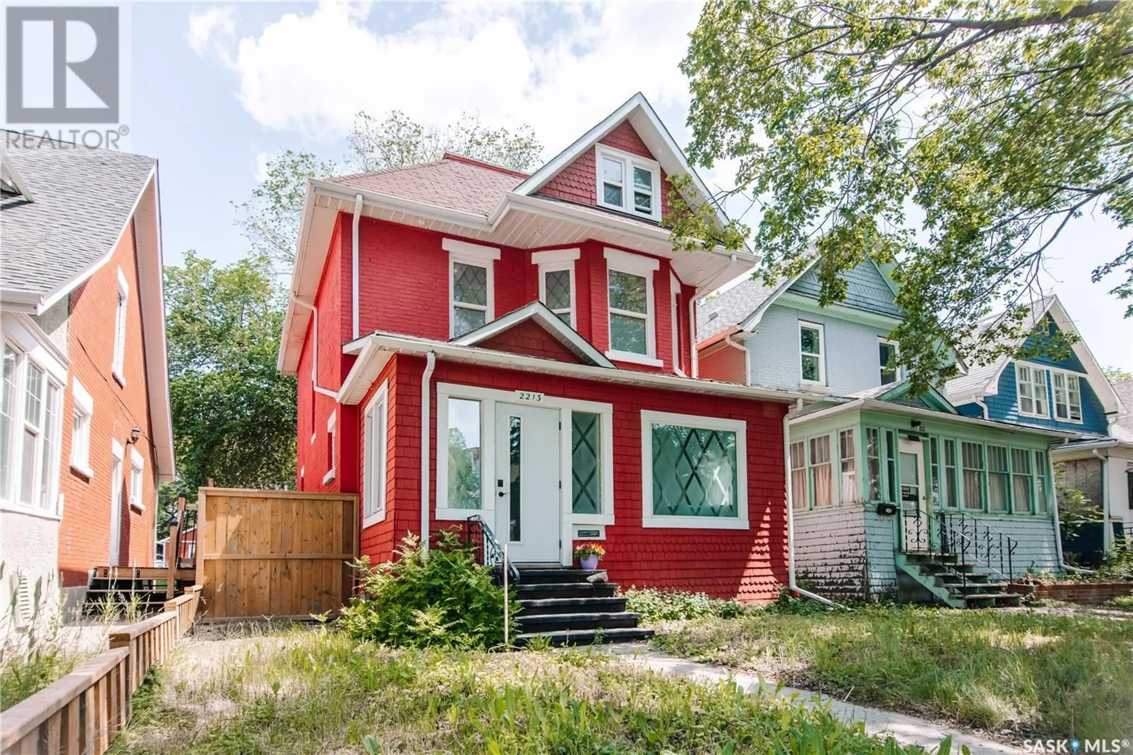 Home with vinyl exterior material, street for 2213 TORONTO STREET, Regina Saskatchewan S4P1N5