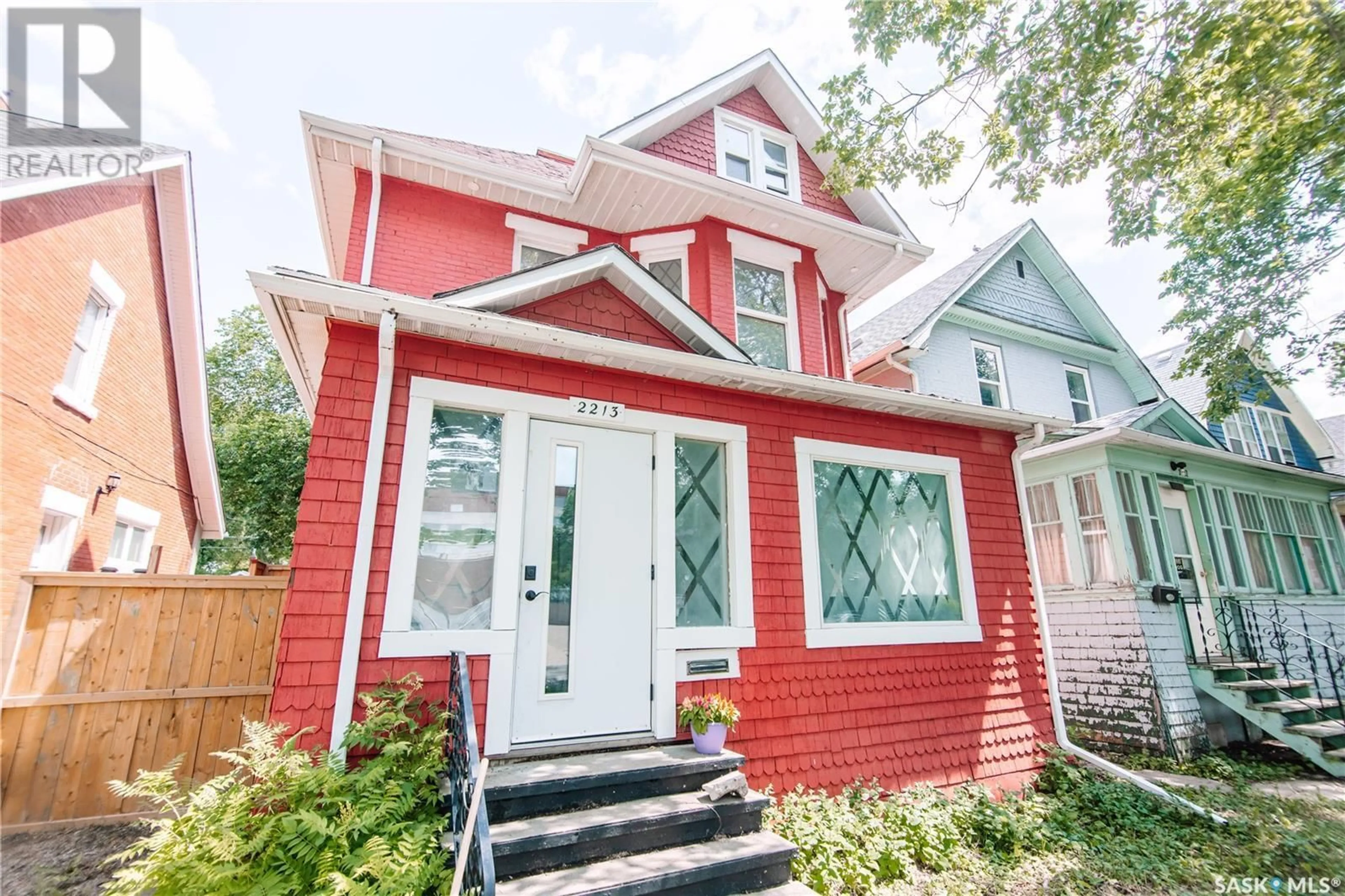 Home with vinyl exterior material, street for 2213 TORONTO STREET, Regina Saskatchewan S4P1N5