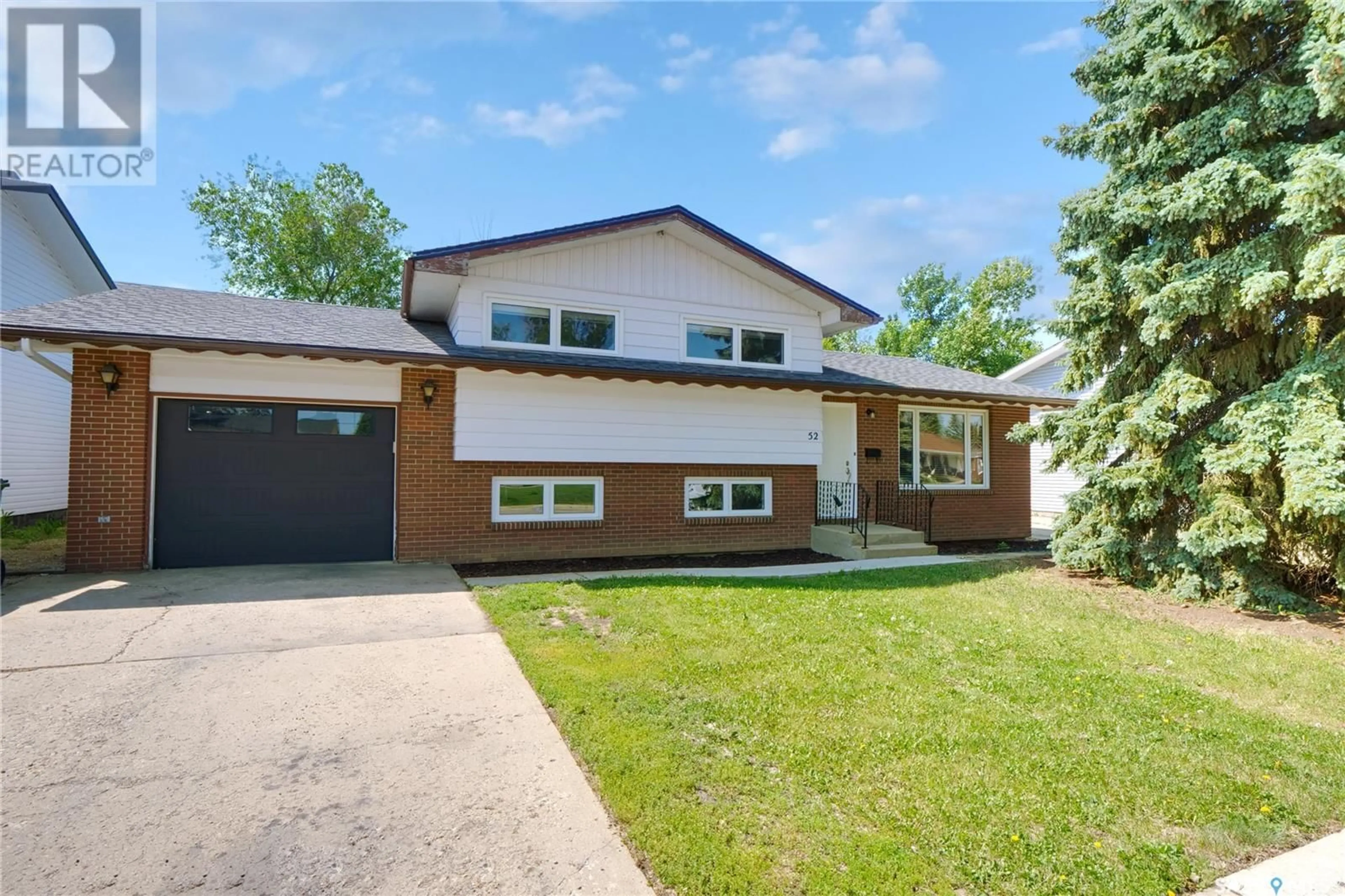 Home with brick exterior material, street for 52 ASTER CRESCENT, Moose Jaw Saskatchewan S6J1A6