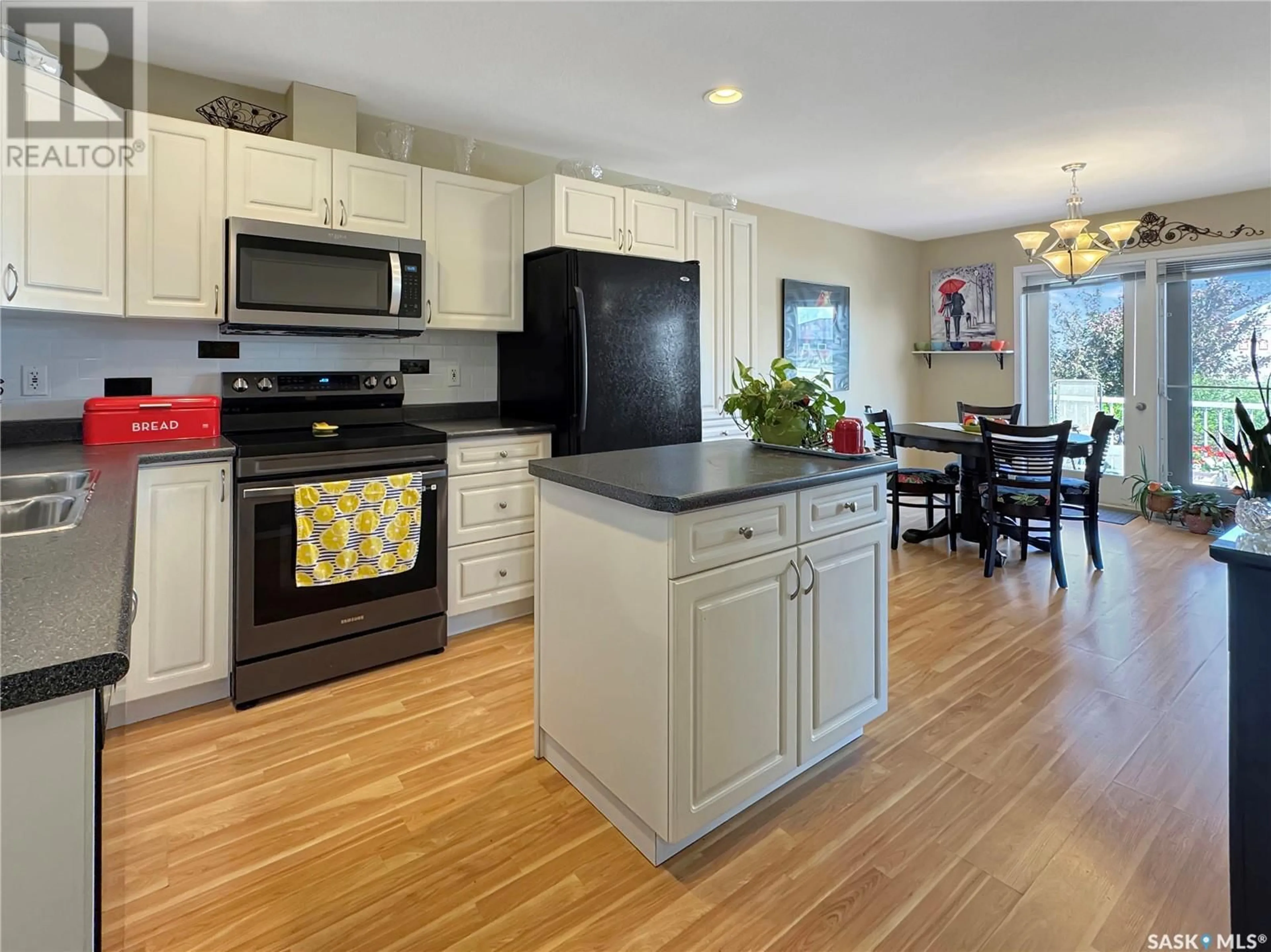 Open concept kitchen, unknown for C - 10901 AMOS DRIVE, North Battleford Saskatchewan S9A0S6