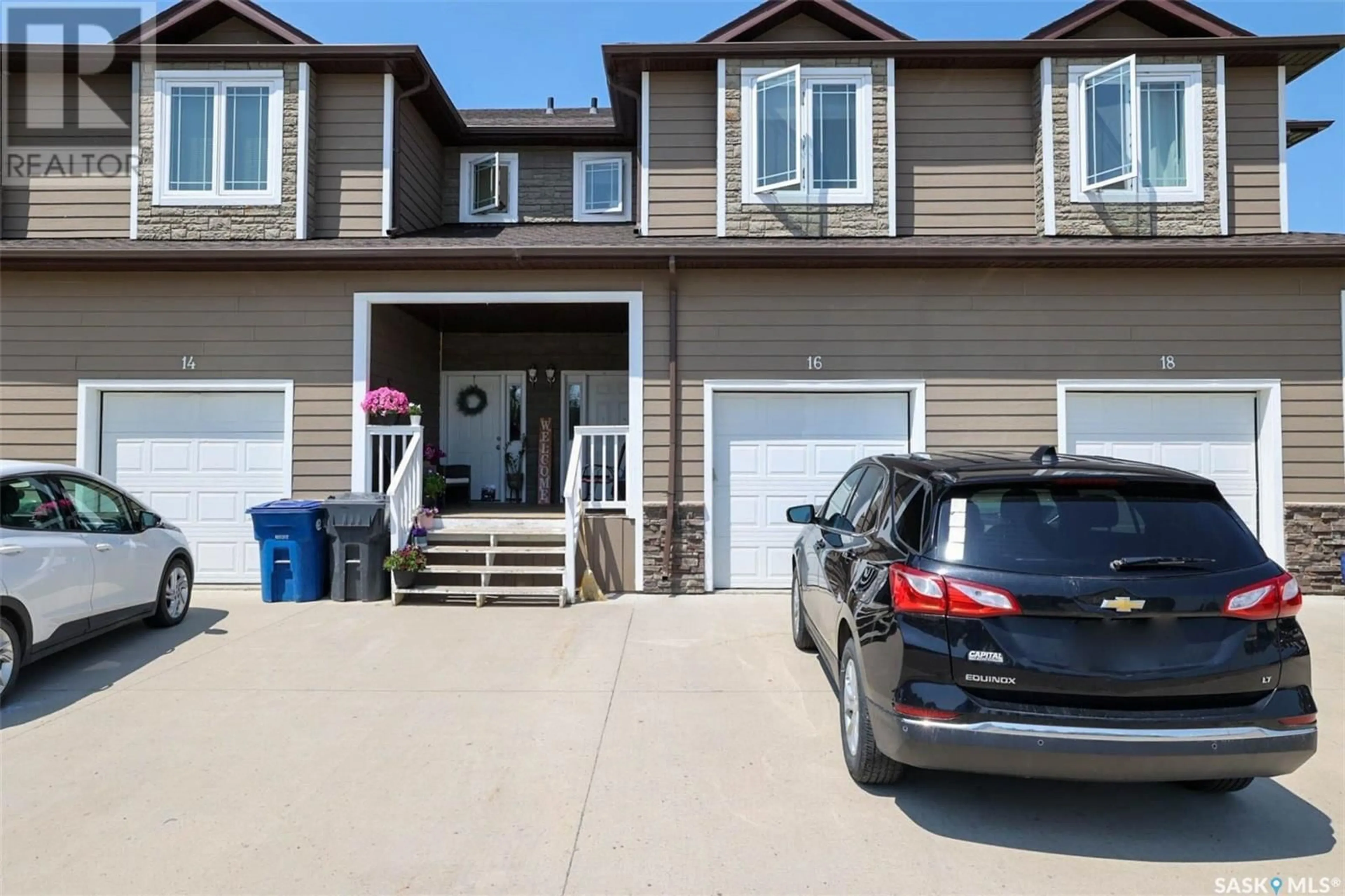 Home with vinyl exterior material, street for 16 MCKENZIE LANE, White City Saskatchewan S4L0B2