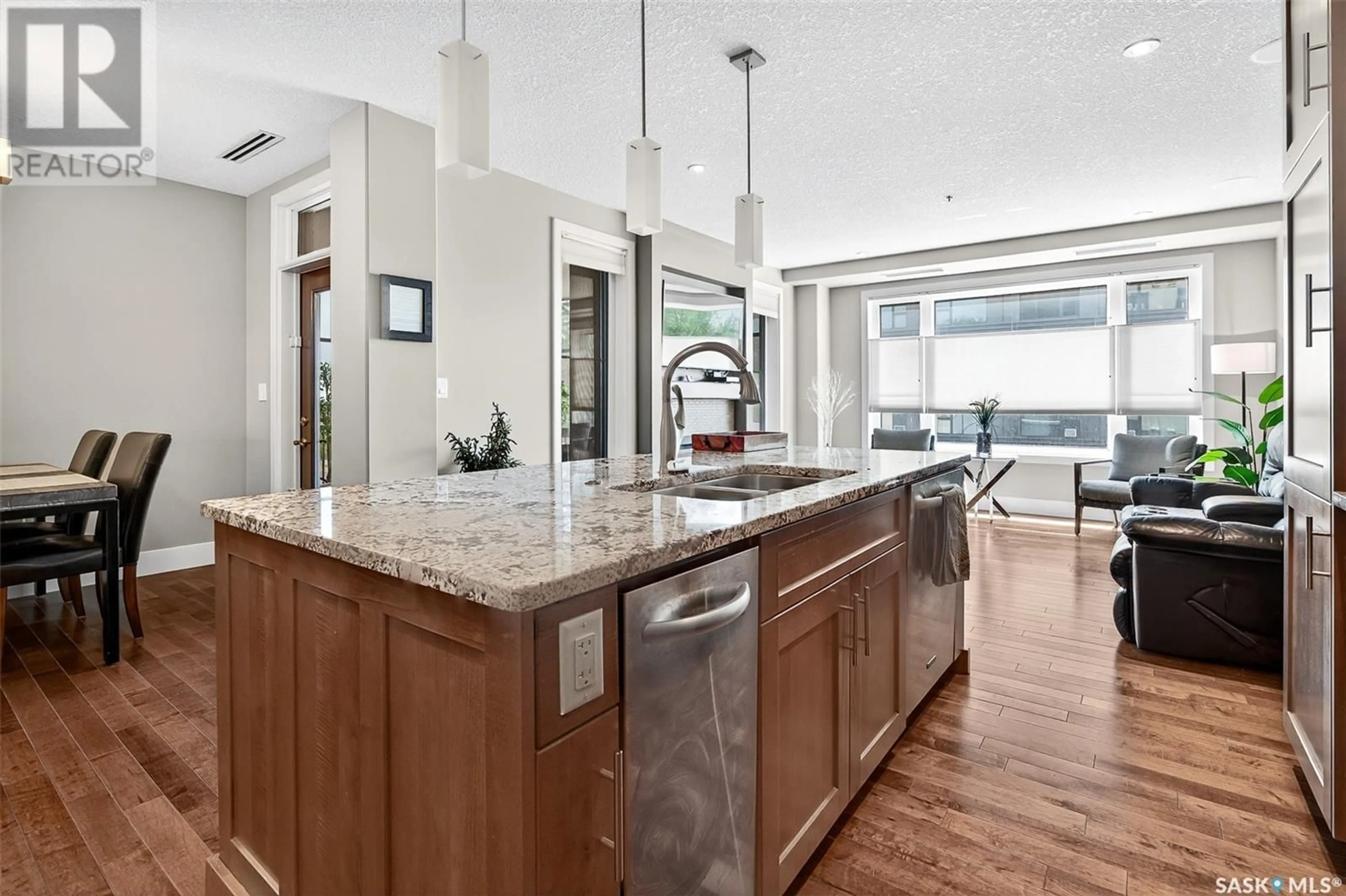 Open concept kitchen, ceramic/tile floor for 302 205 FAIRFORD STREET E, Moose Jaw Saskatchewan S6H0E1