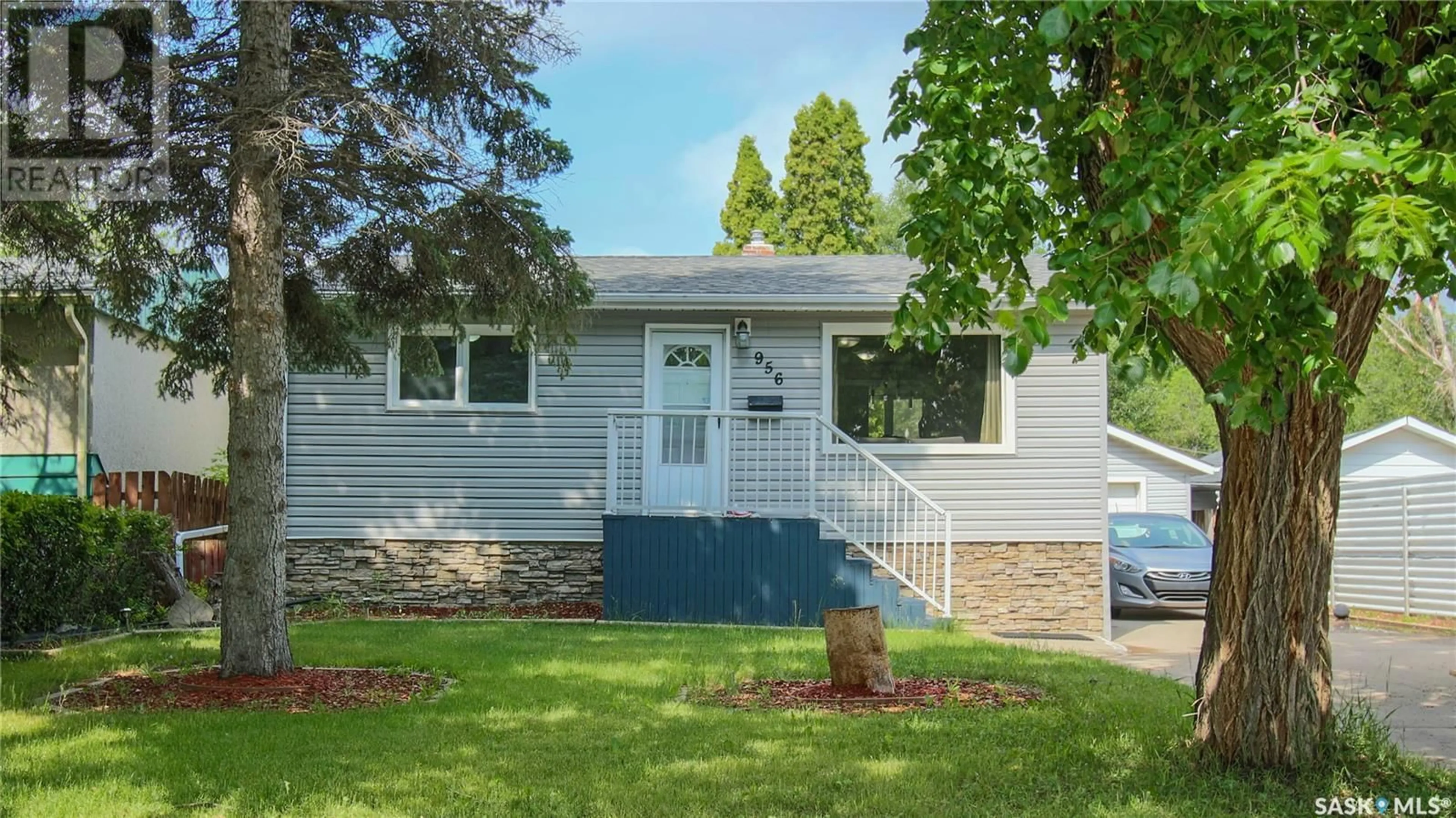 Home with vinyl exterior material, street for 956 ROYAL STREET, Regina Saskatchewan S4T4Z6
