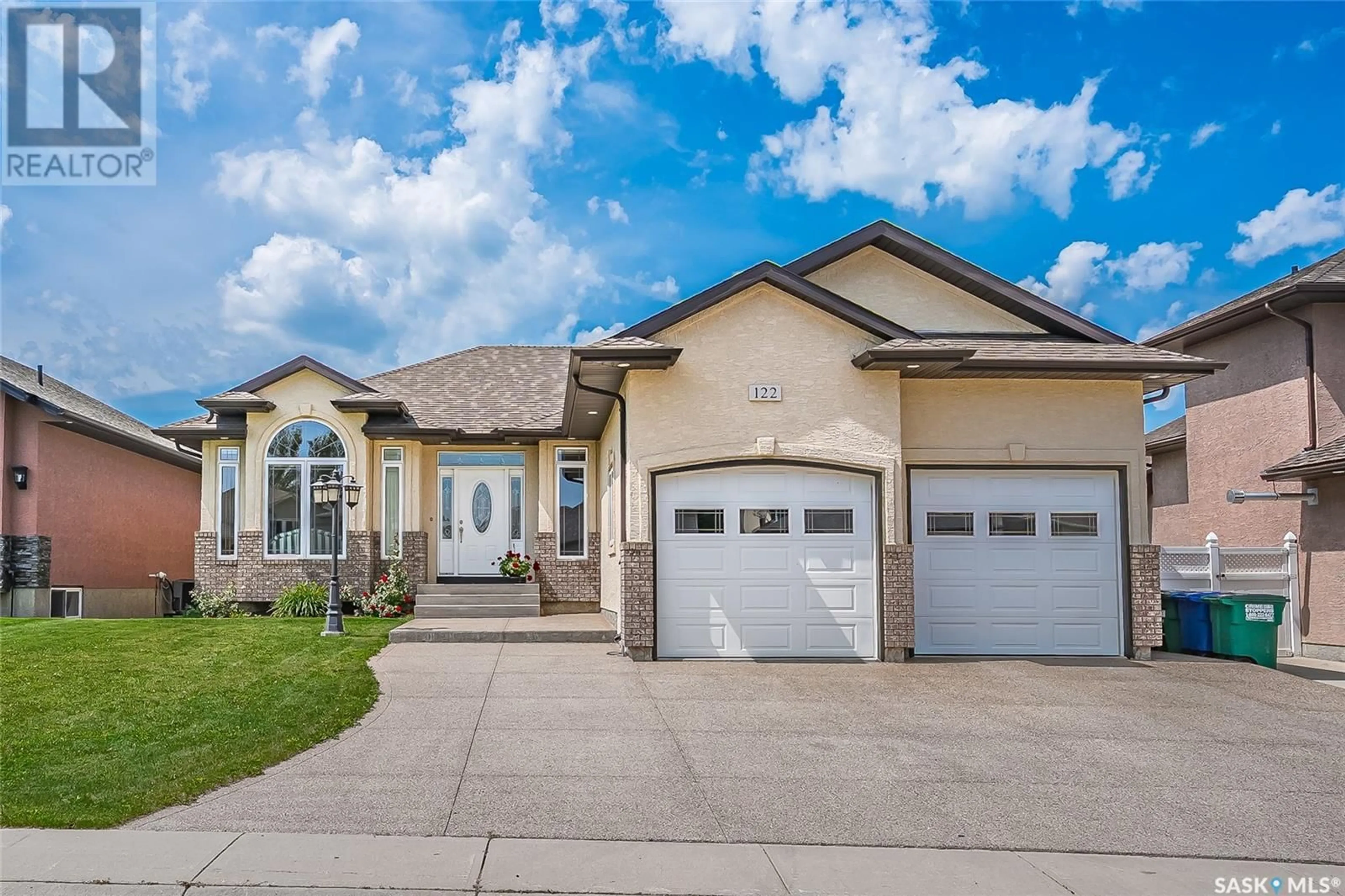 Home with vinyl exterior material, street for 122 ALLWOOD CRESCENT, Saskatoon Saskatchewan S7R0A3