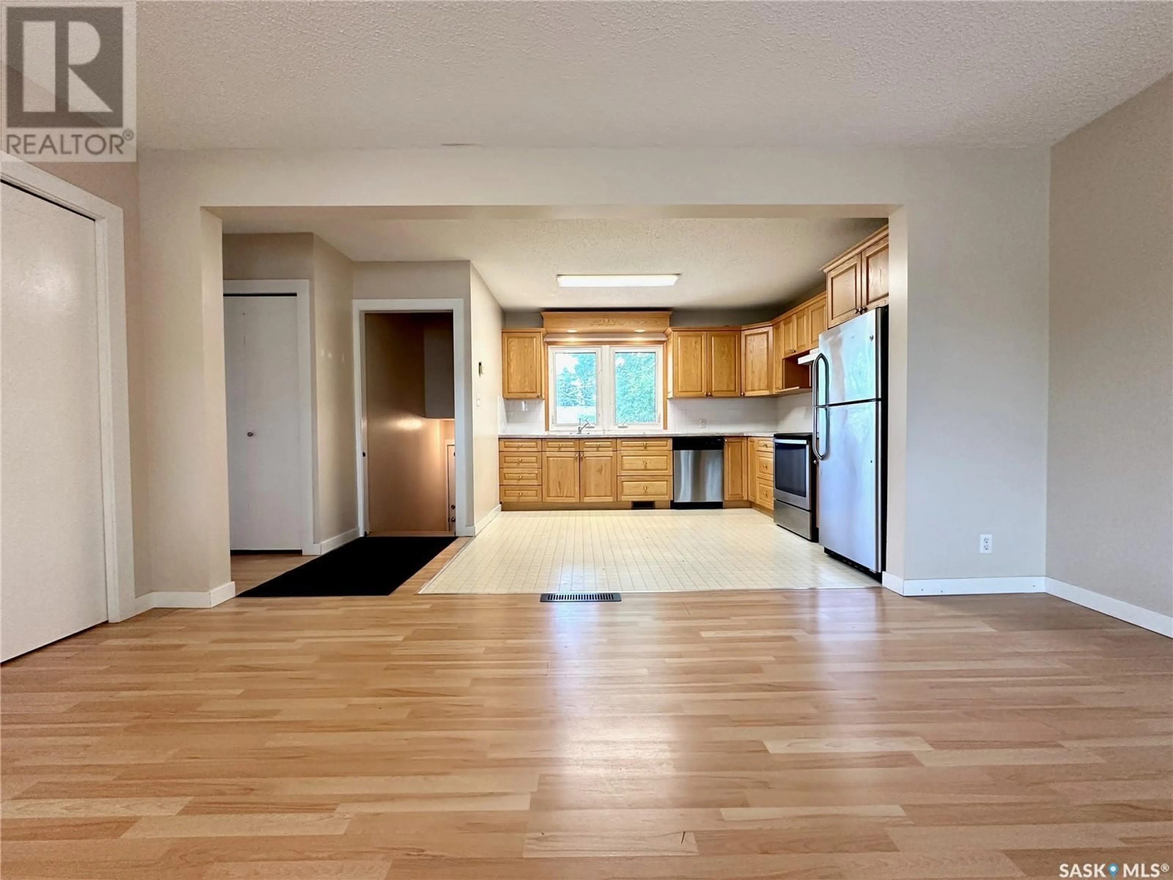 Open concept kitchen, wood/laminate floor for 120 7TH AVENUE, Warman Saskatchewan S0K4S0