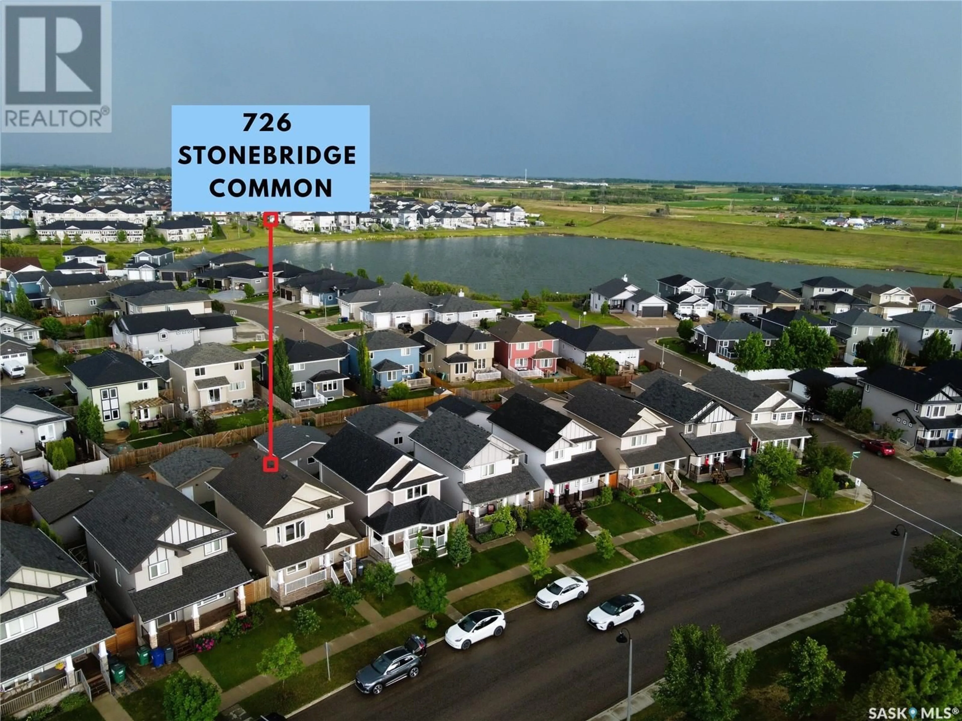 A pic from outside/outdoor area/front of a property/back of a property/a pic from drone, street for 726 STONEBRIDGE COMMON, Saskatoon Saskatchewan S7T0M8