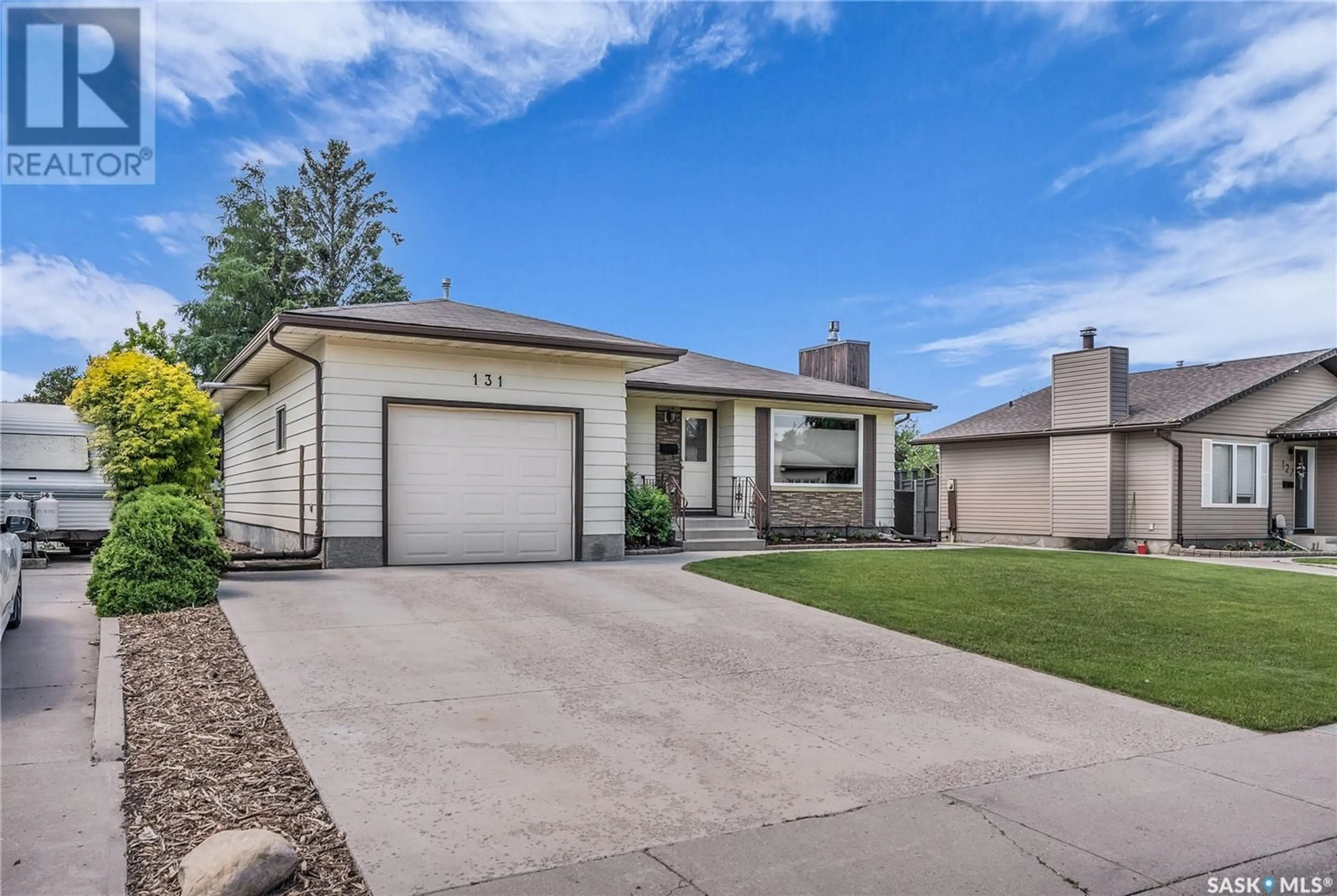 Home with vinyl exterior material, street for 131 DAVID KNIGHT CRESCENT, Saskatoon Saskatchewan S7K5L5
