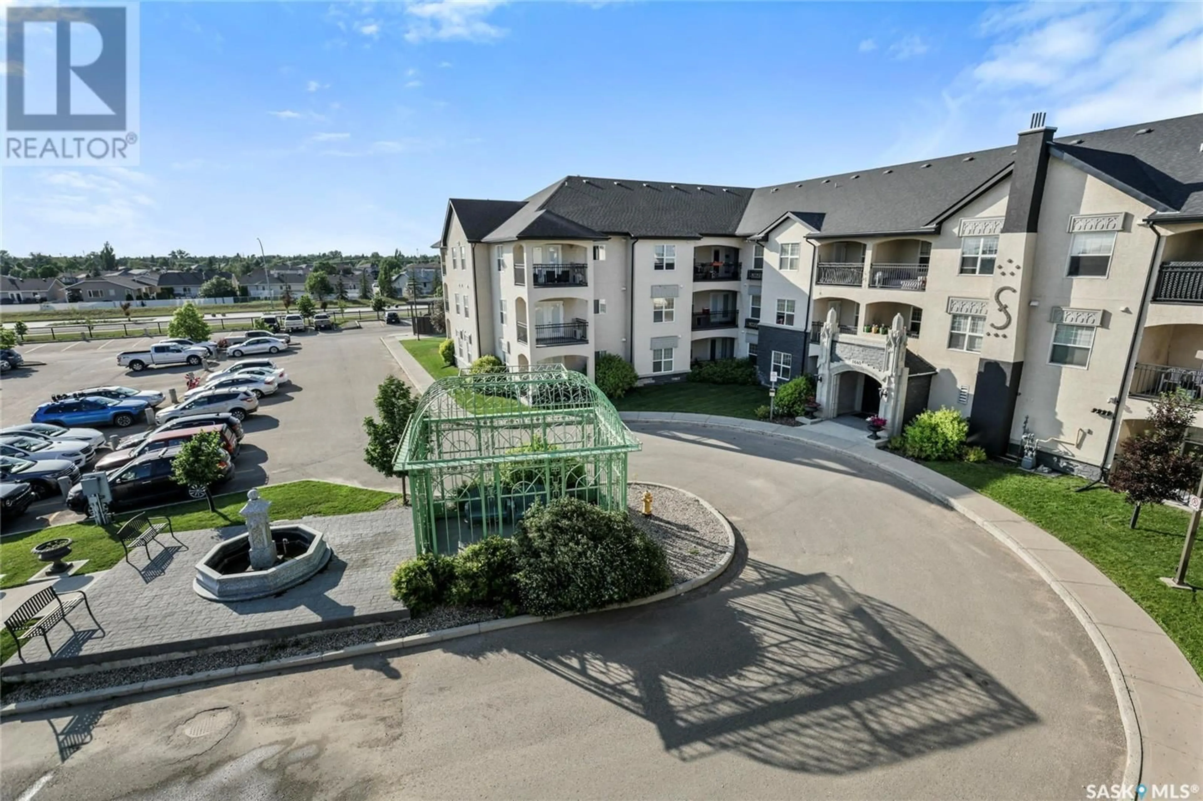 A pic from outside/outdoor area/front of a property/back of a property/a pic from drone, unknown for 316 1640 DAKOTA DRIVE, Regina Saskatchewan S4Z0A4