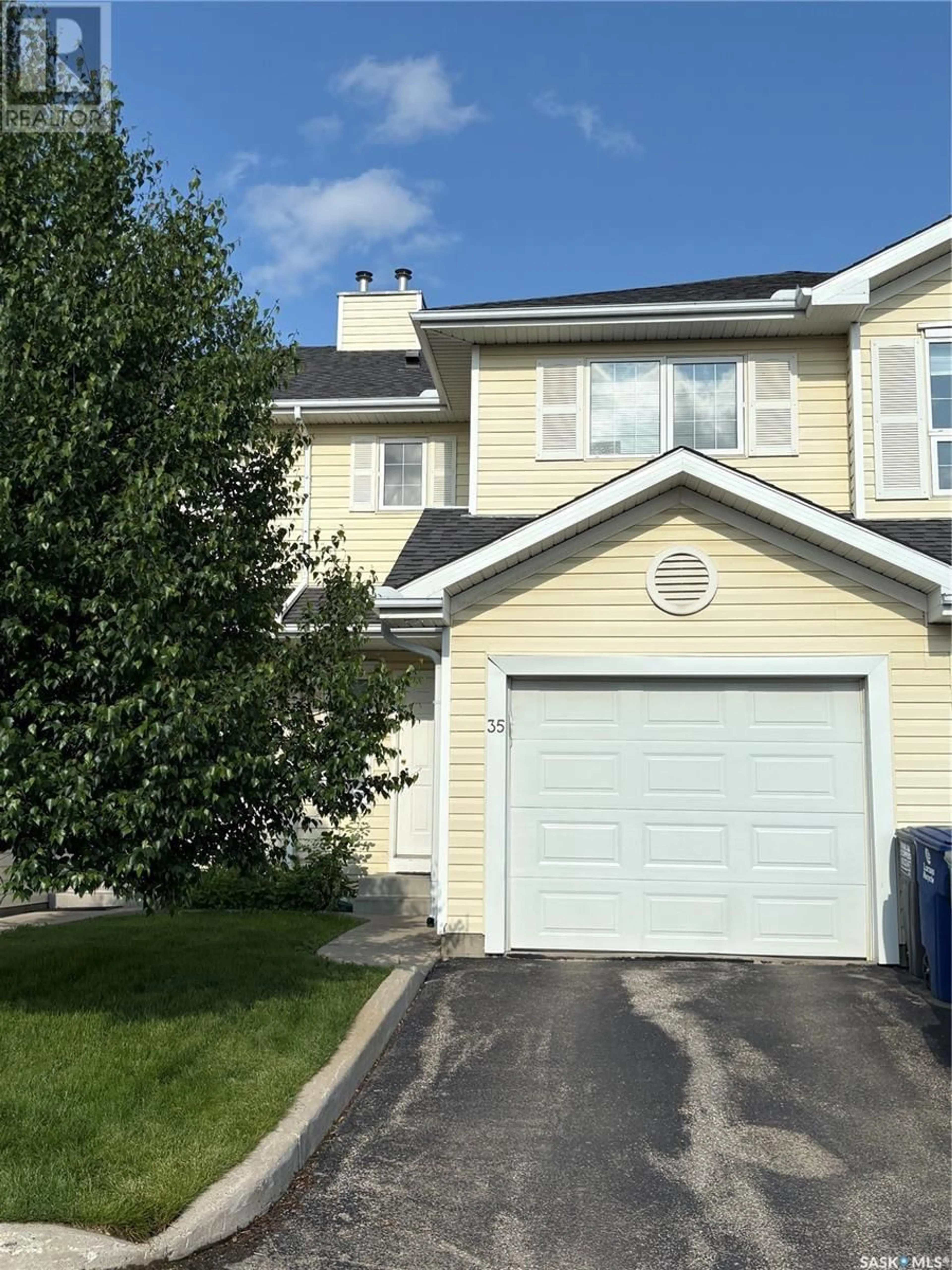 Home with vinyl exterior material, street for 35 111 FAIRBROTHER CRESCENT, Saskatoon Saskatchewan S7S0A3