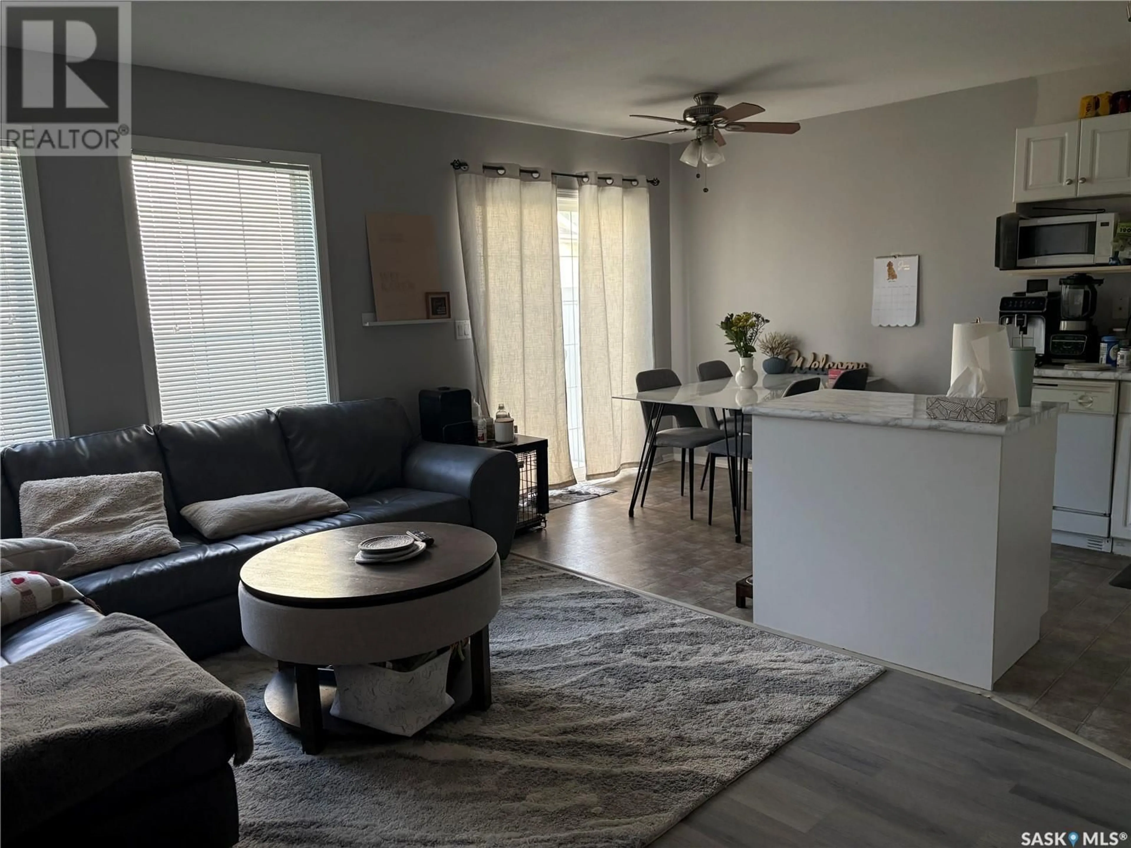 Living room with furniture, unknown for 35 111 FAIRBROTHER CRESCENT, Saskatoon Saskatchewan S7S0A3